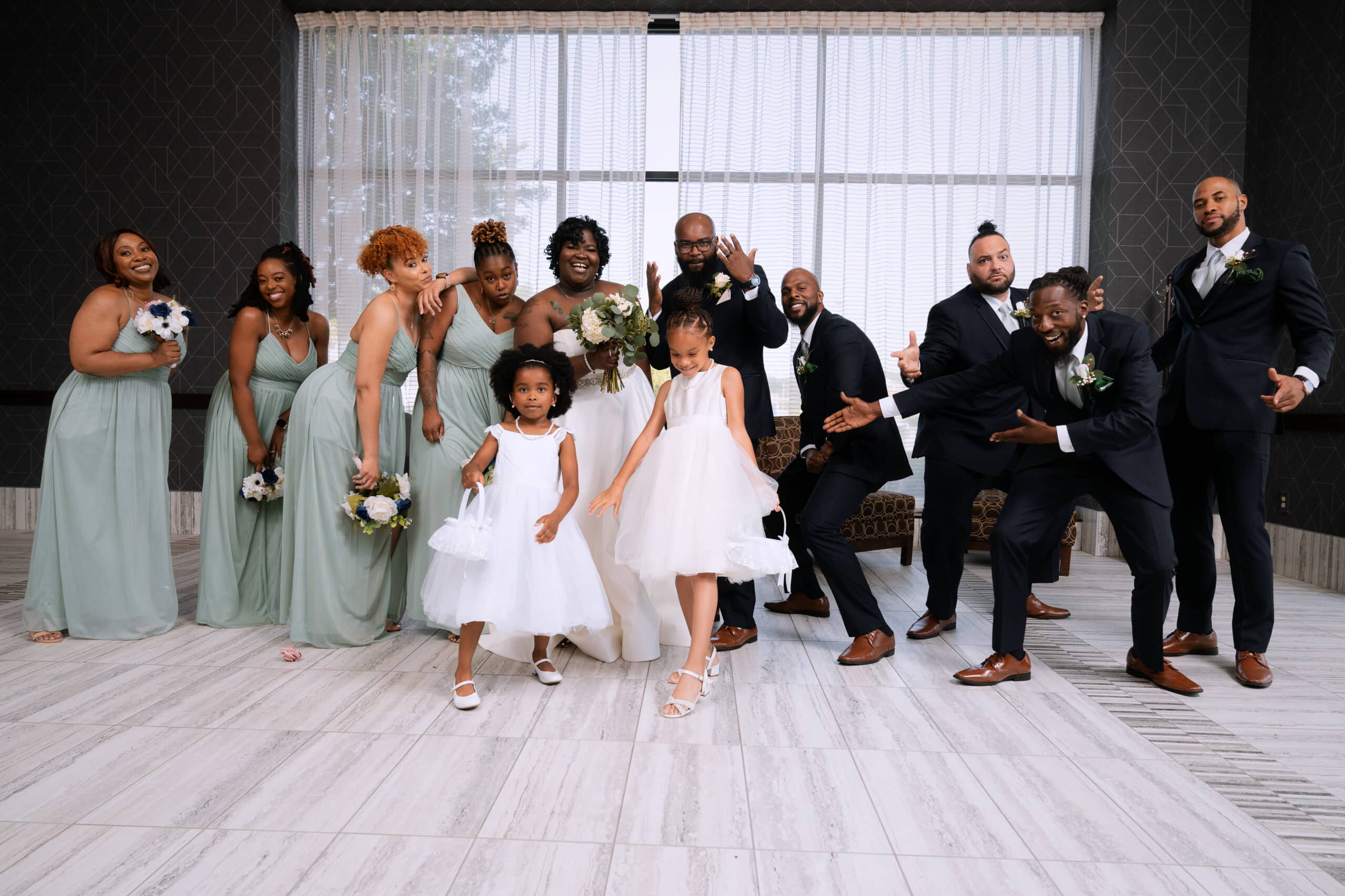 The bride's first wedding day with the first wedding picture with the entire wedding party photo, taken at the Hilton, located in Greenville, NC