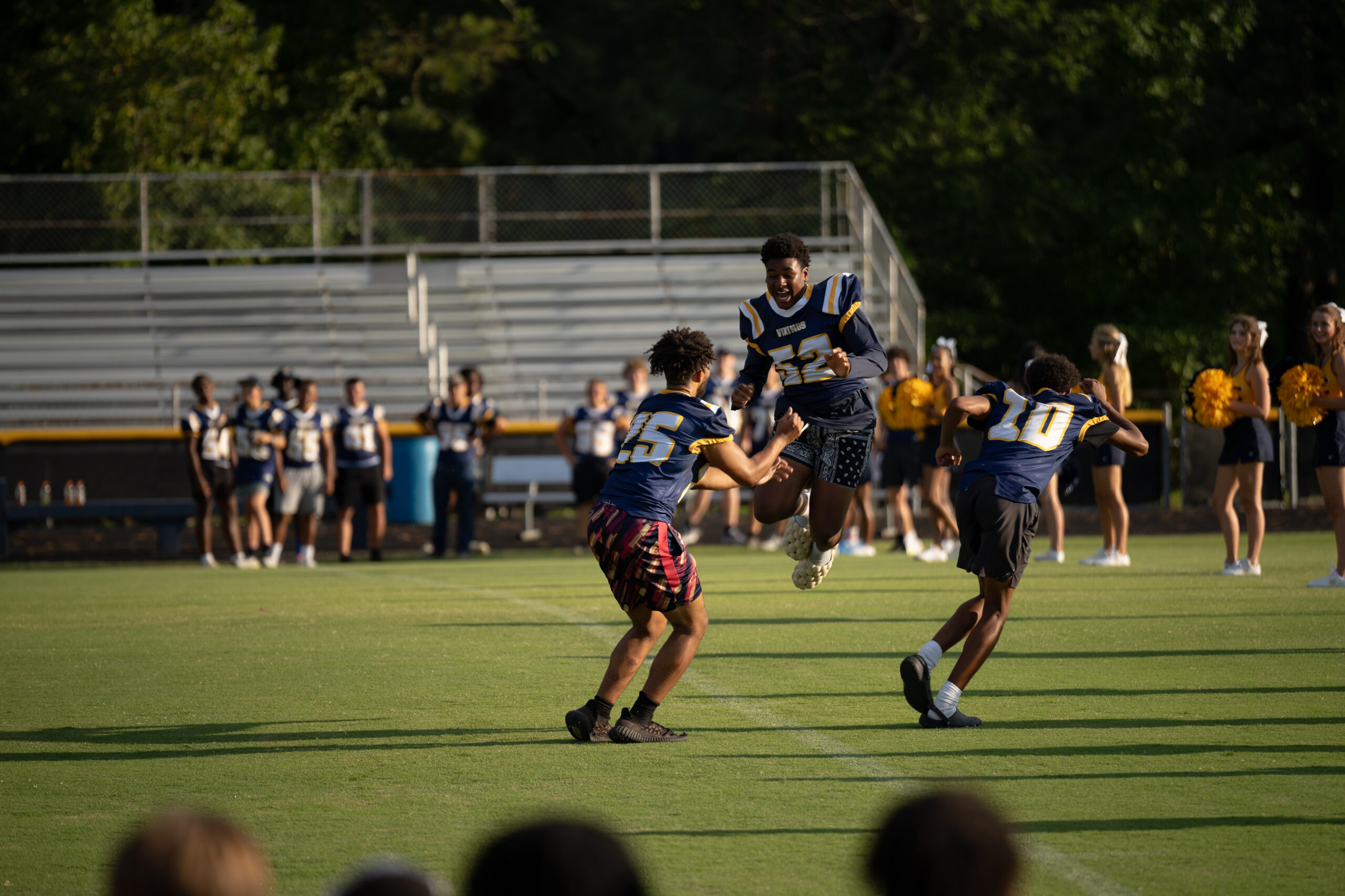 My First ECU College Football Photography Assignment 152 Players running drills on the practice field in daylight