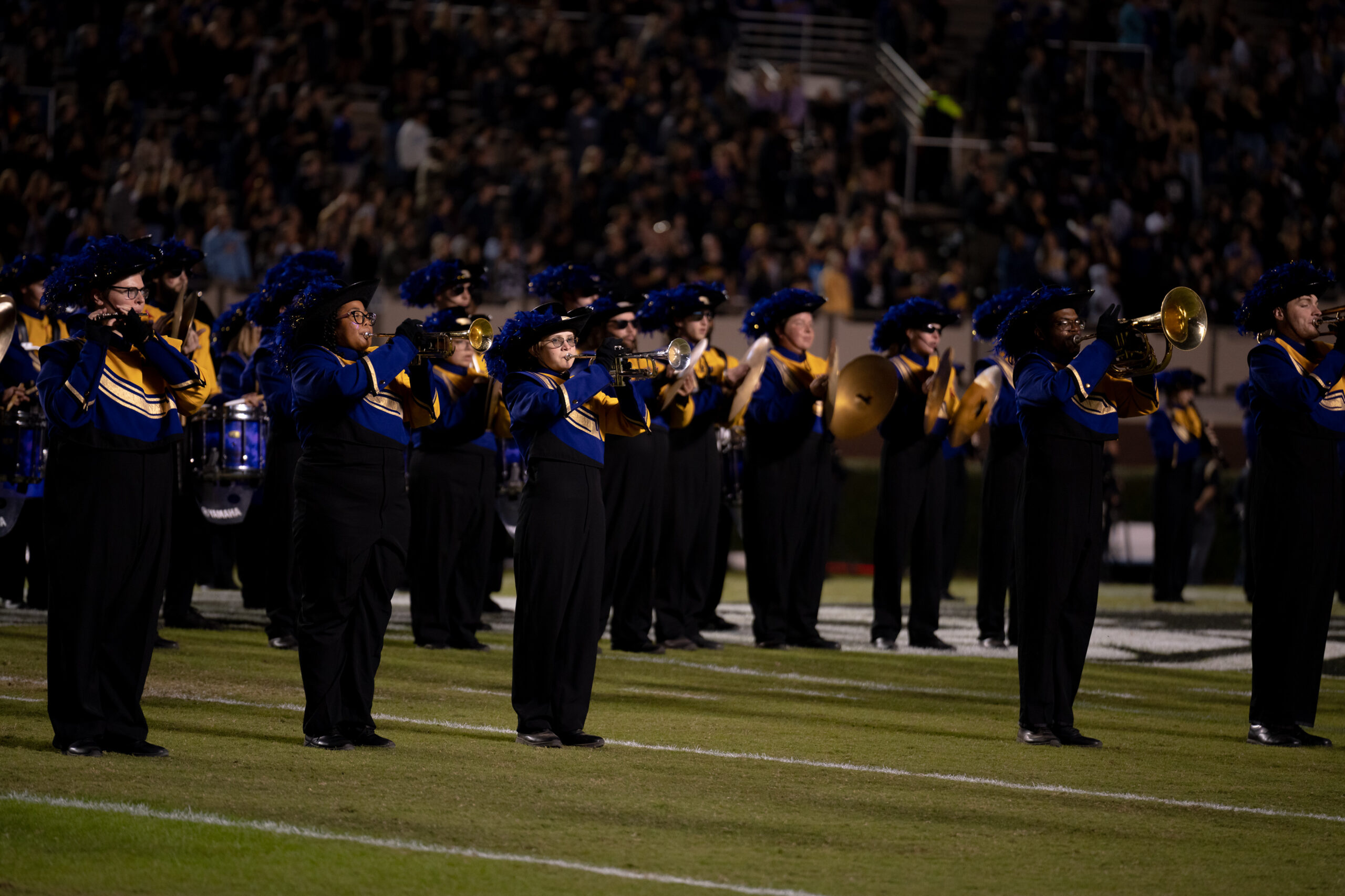 My First ECU College Football Photography Assignment 193 ECU band in plumed hats marching on the field
