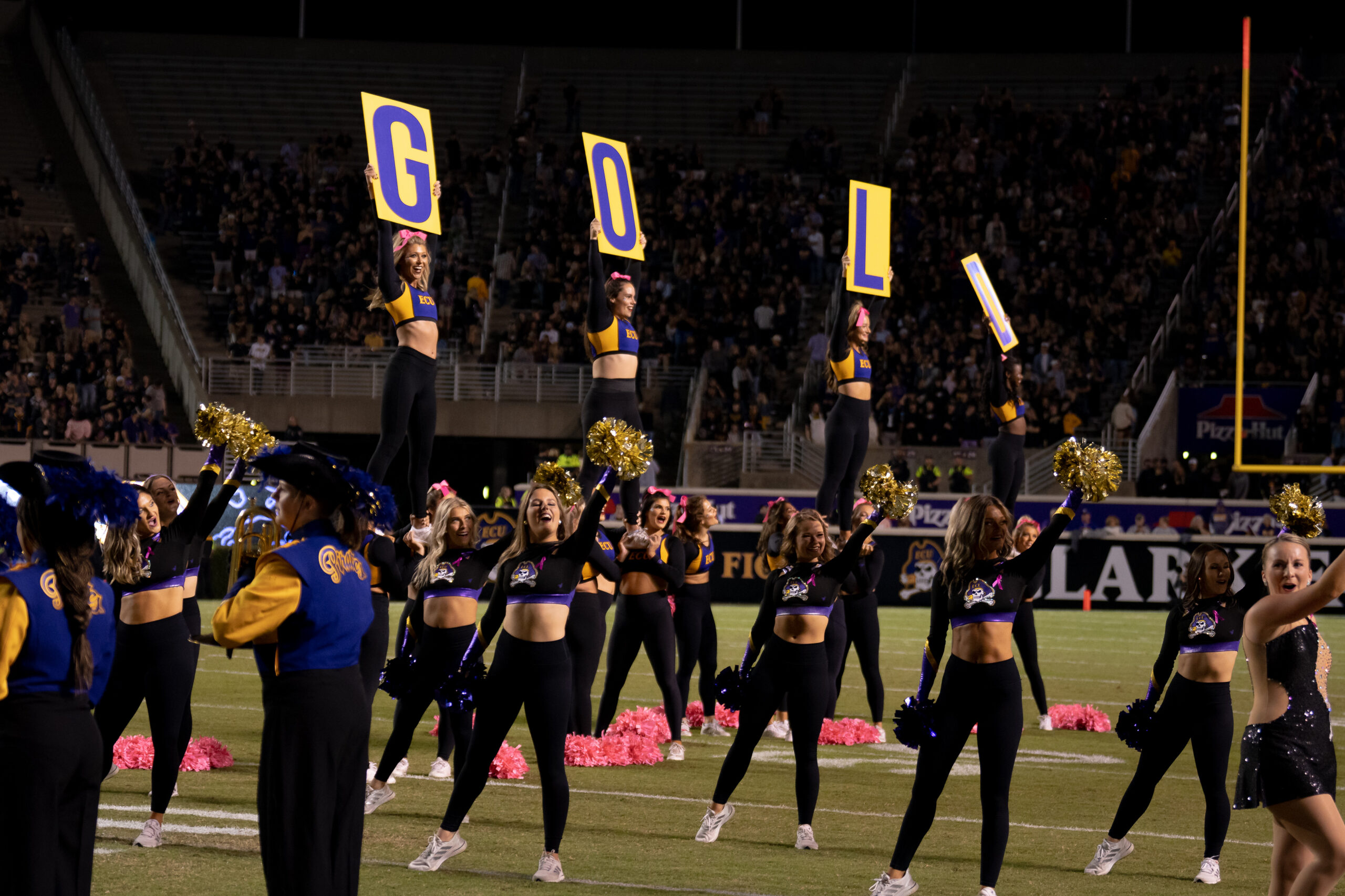 My First ECU College Football Photography Assignment 244 ECU flag runners leading the team onto the field