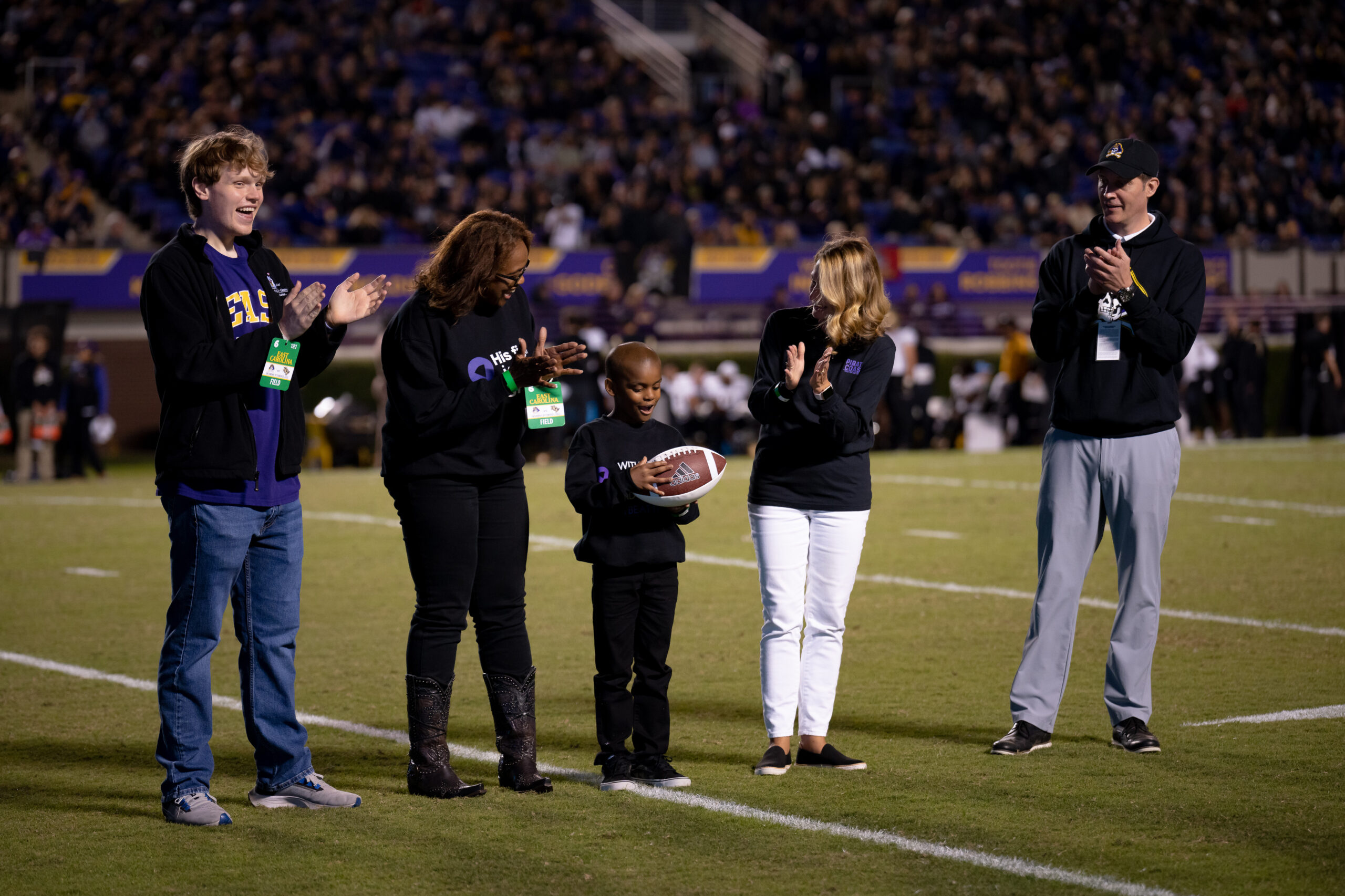 My First ECU College Football Photography Assignment 94 Team captains meeting at midfield for the coin toss