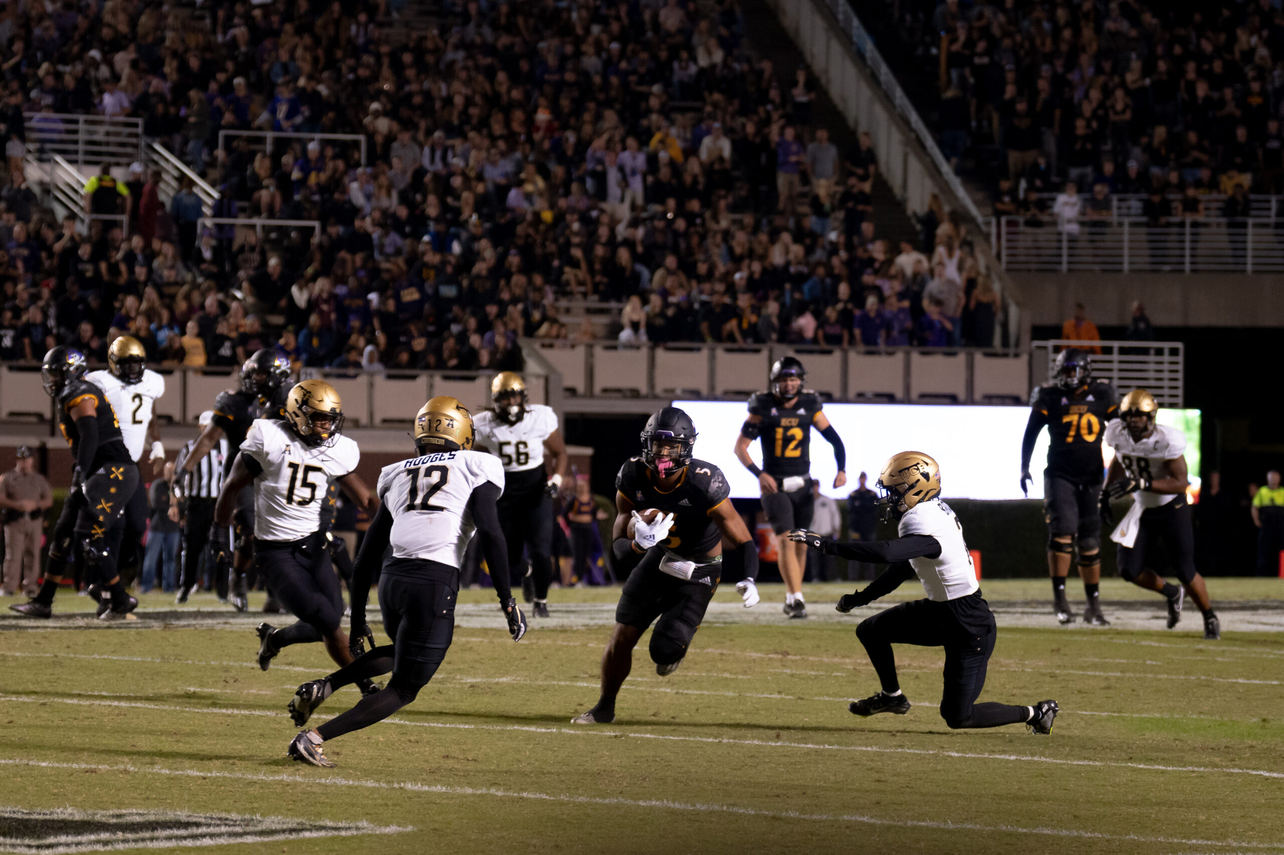 My First ECU College Football Photography Assignment 288 Kick return in progress under the stadium lights