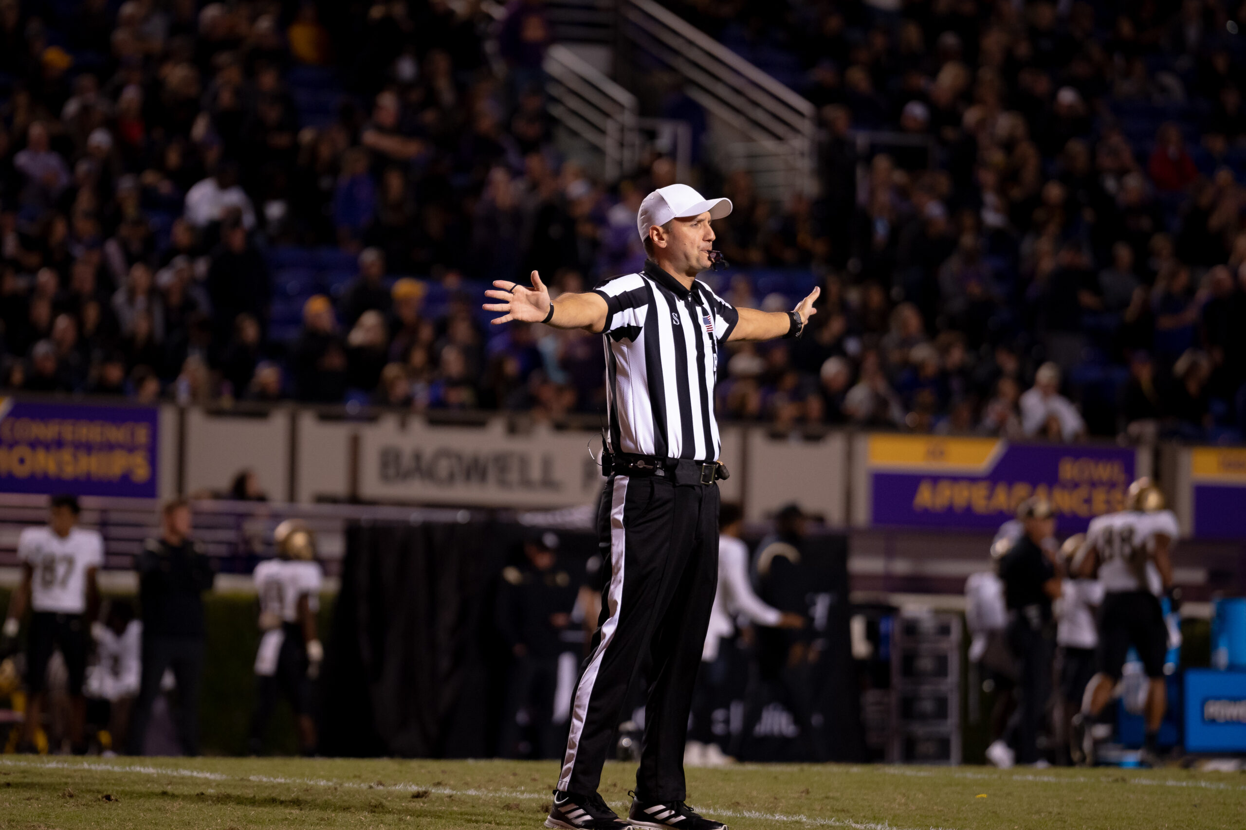 My First ECU College Football Photography Assignment 271 Referee signaling a call on the field