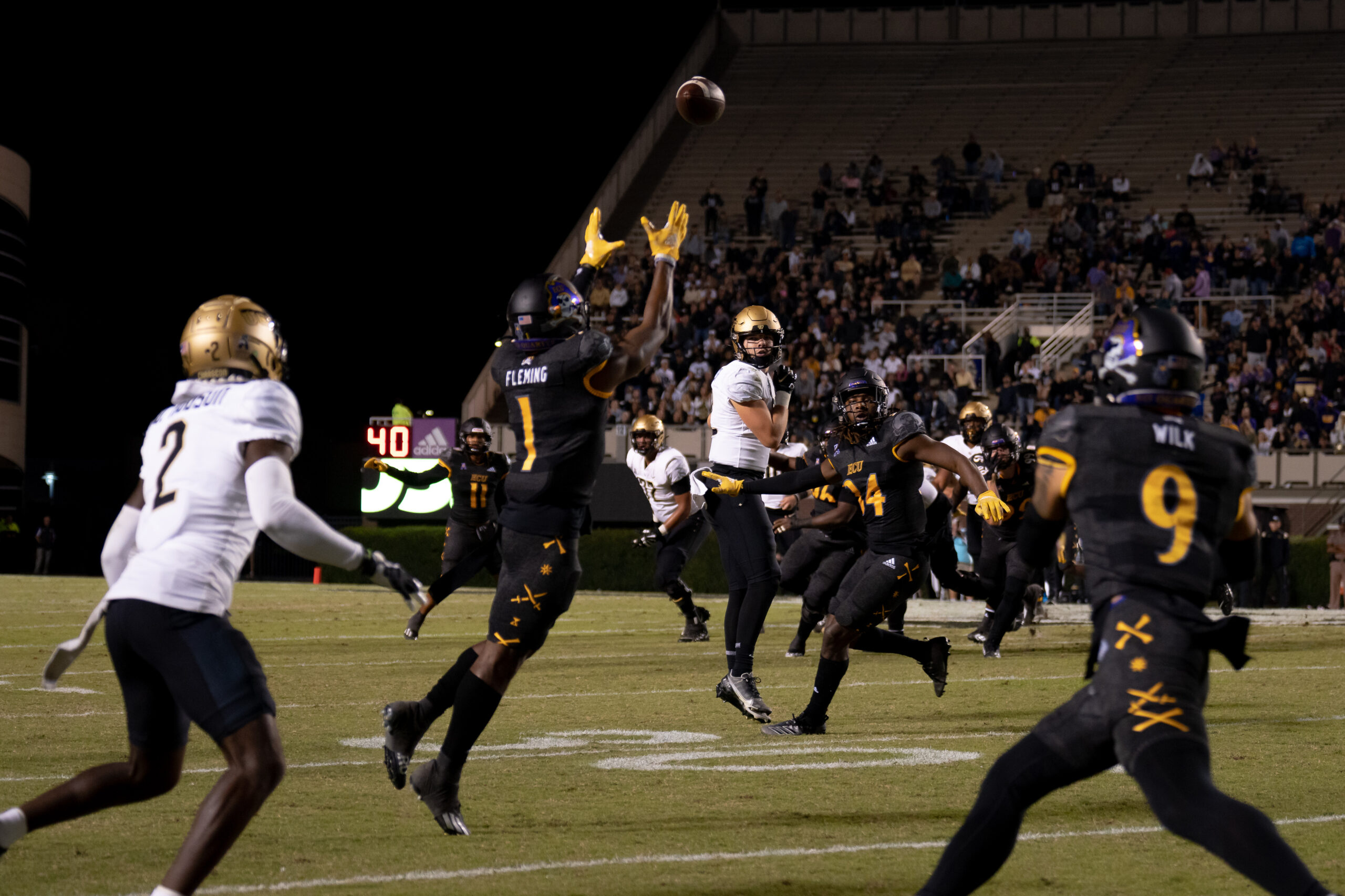 My First ECU College Football Photography Assignment 221 UCF and ECU players racing after a loose ball