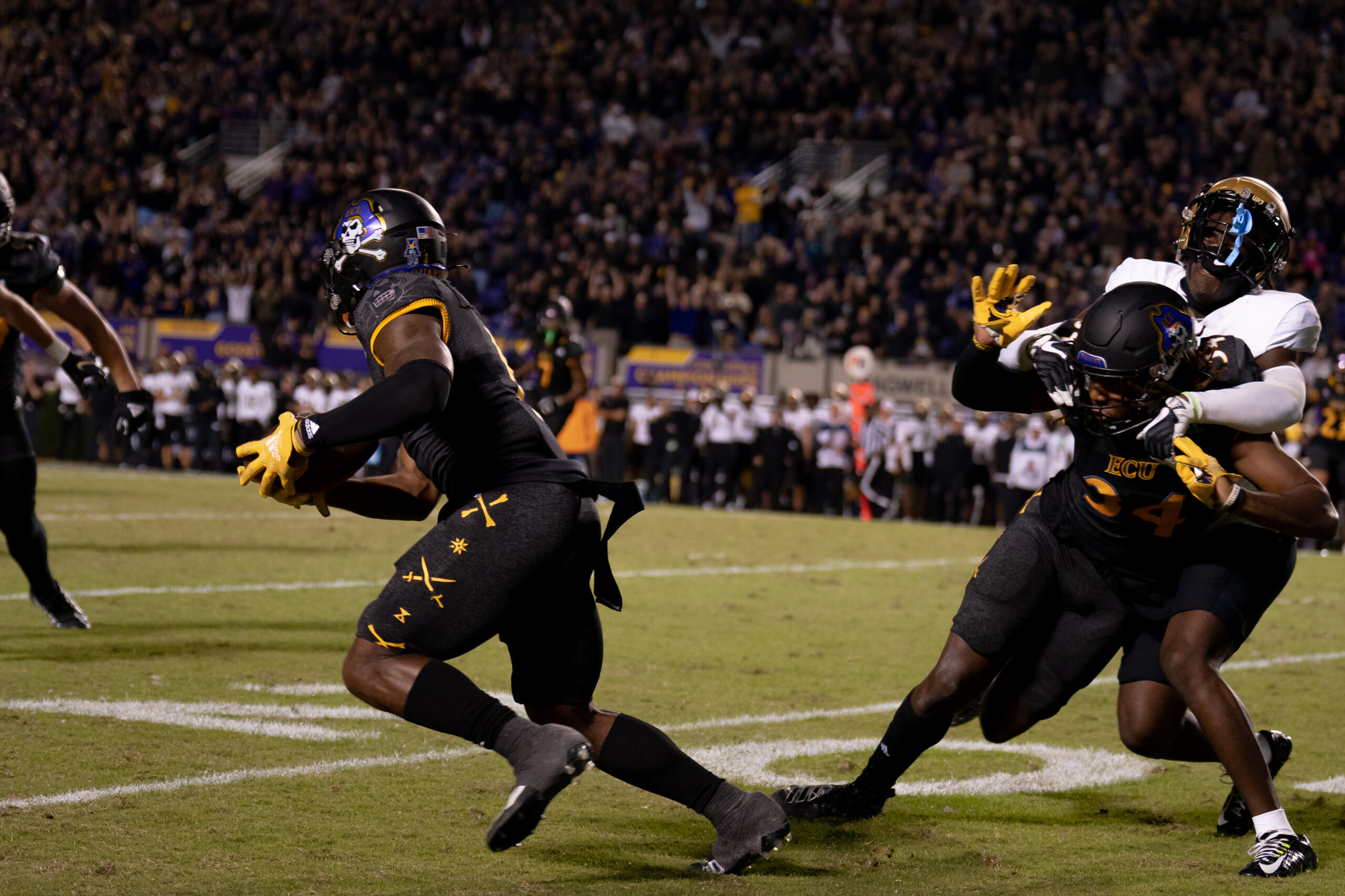 My First ECU College Football Photography Assignment 169 ECU defenders pursuing a running back