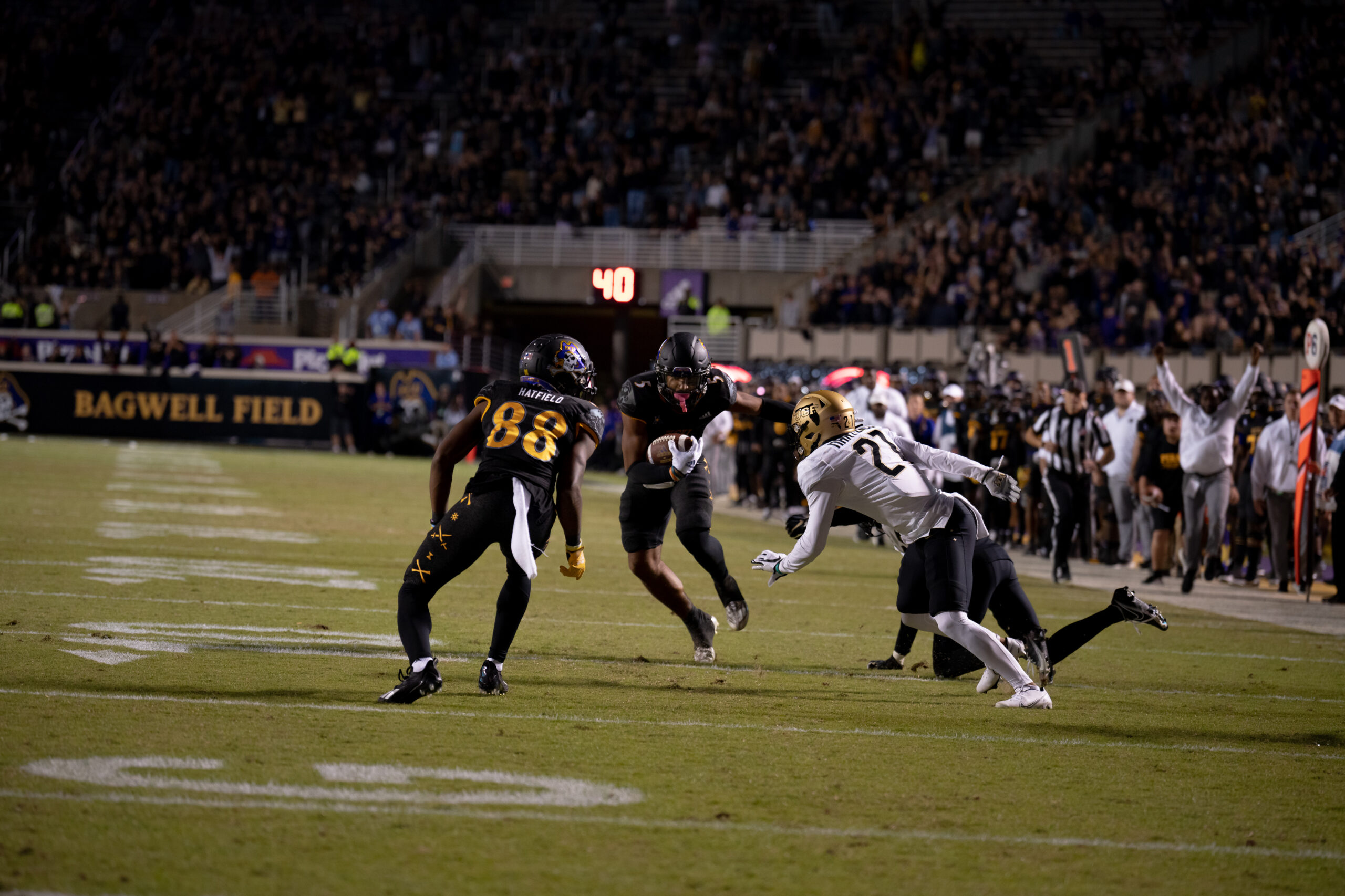 My First ECU College Football Photography Assignment 106 ECU kicker following through on a field goal attempt