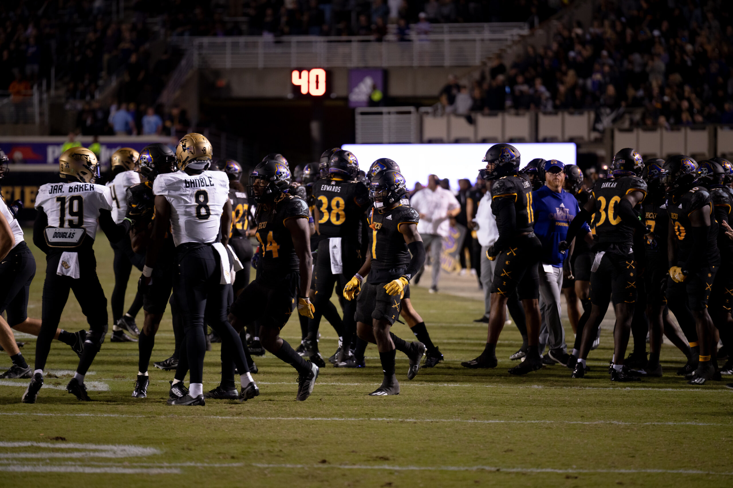 My First ECU College Football Photography Assignment 167 ECU and UCF players lined up for a snap at night