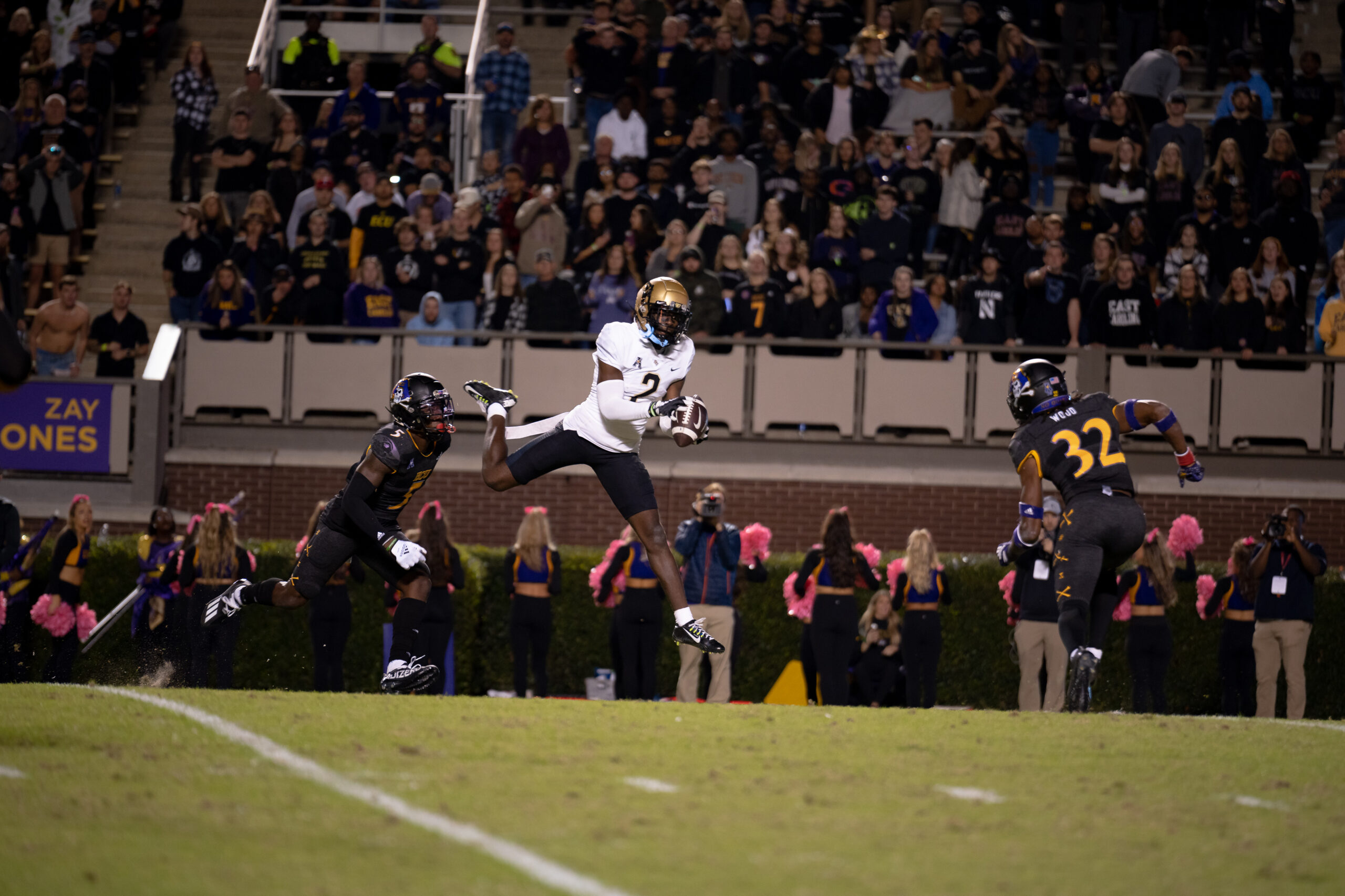 My First ECU College Football Photography Assignment 191 UCF receiver catching a pass near the sideline