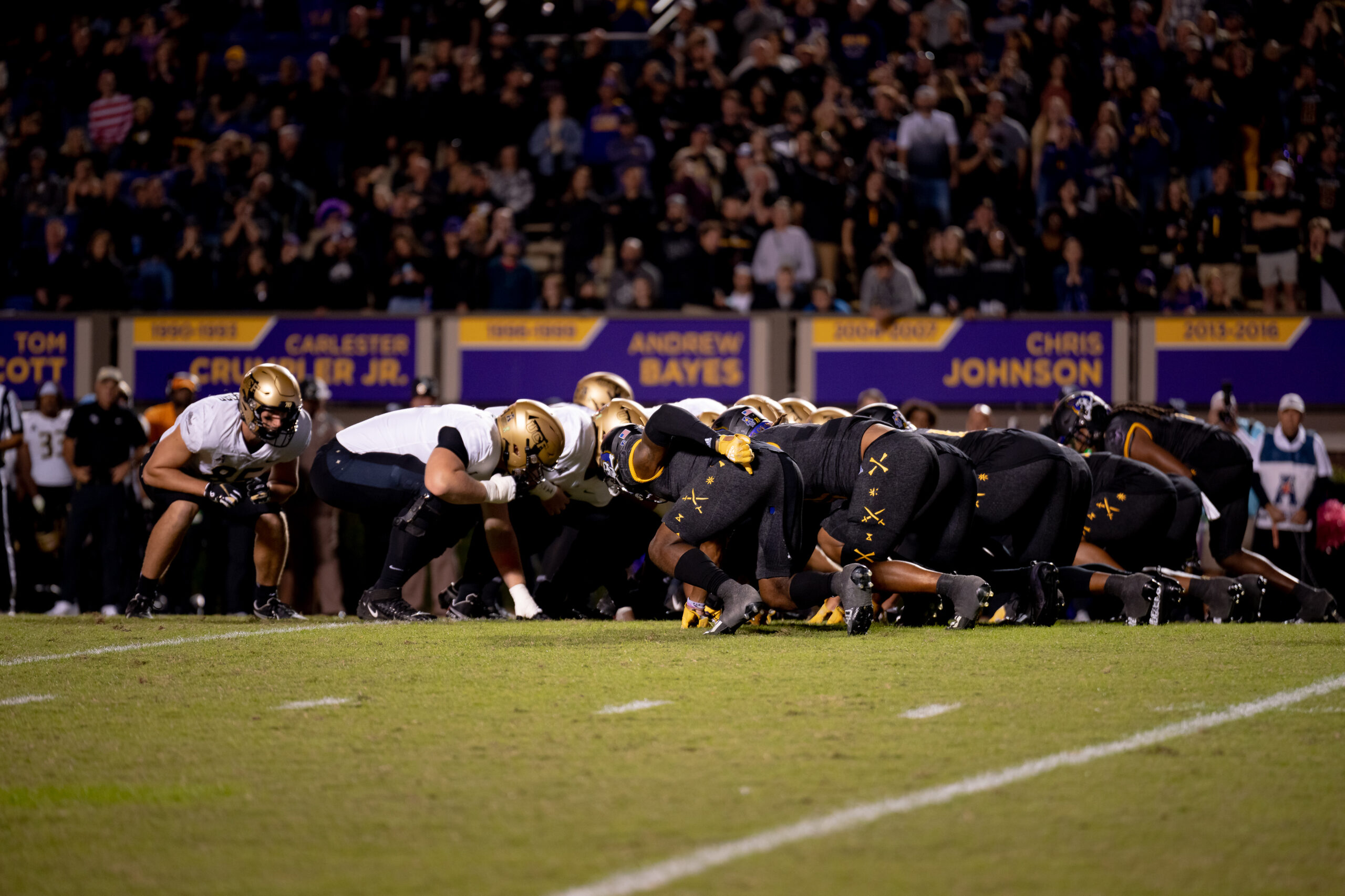 My First ECU College Football Photography Assignment 148 Players piled up at the goal line in front of the crowd