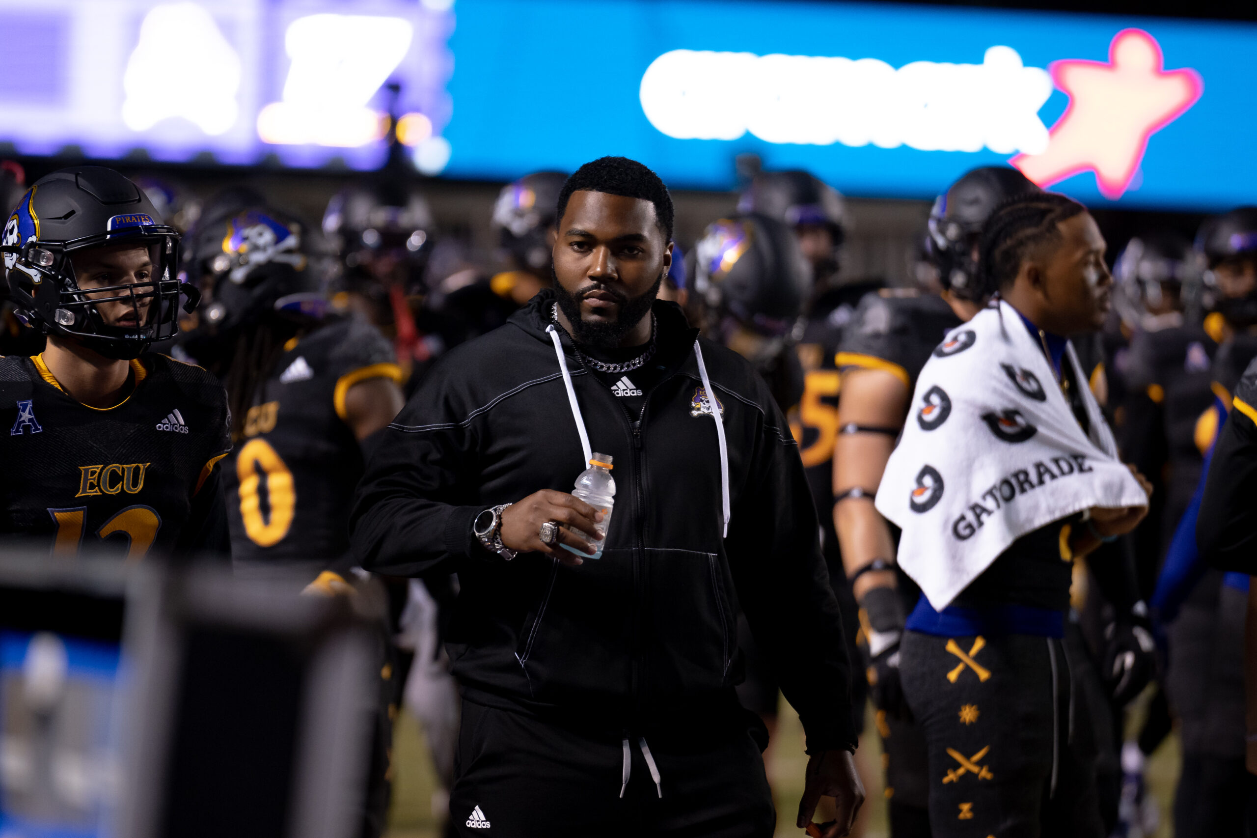 My First ECU College Football Photography Assignment 246 ECU staff and players on the sideline beneath the video board