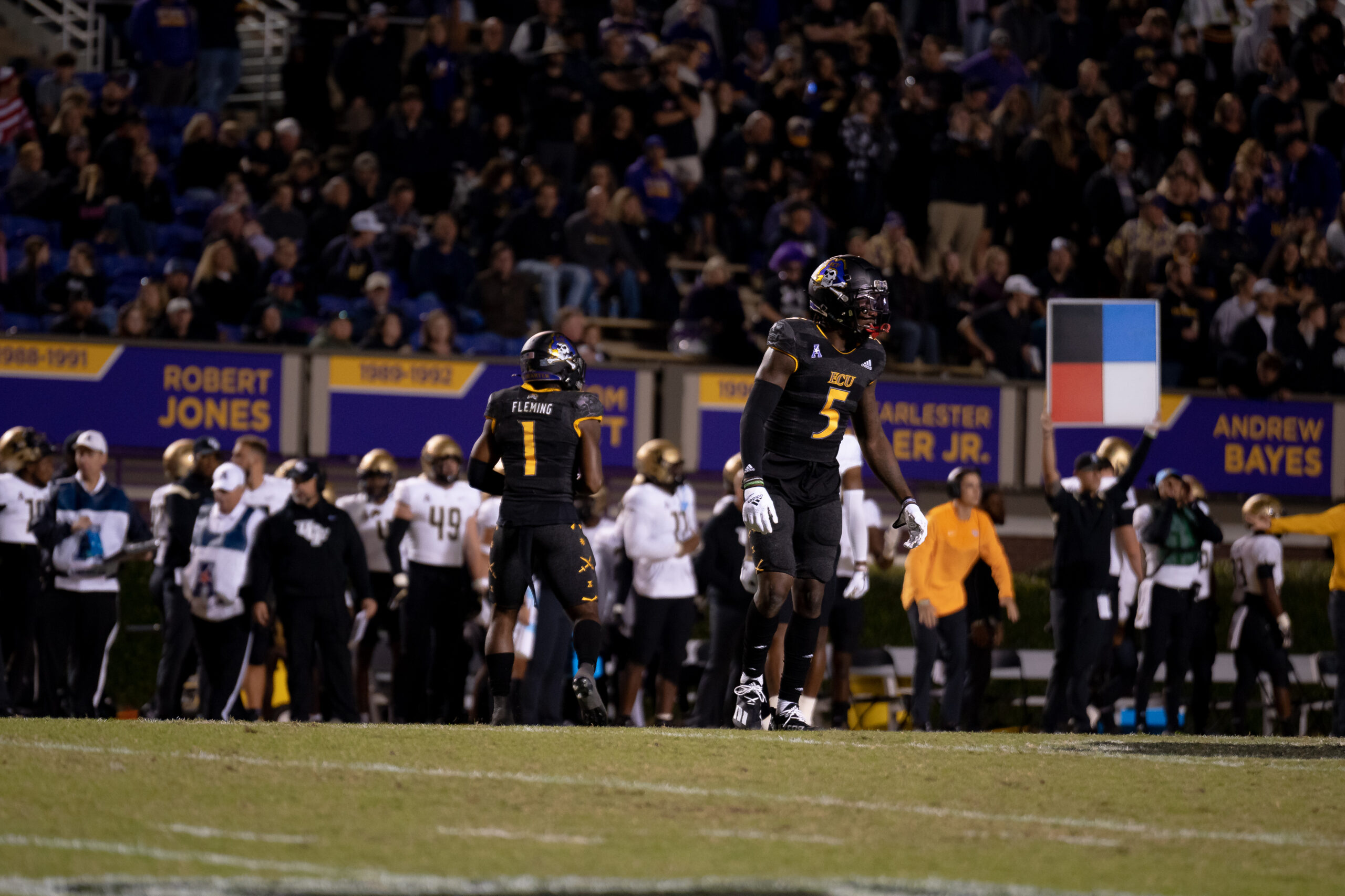 My First ECU College Football Photography Assignment 4 ECU fans and band filling the stands at a night game