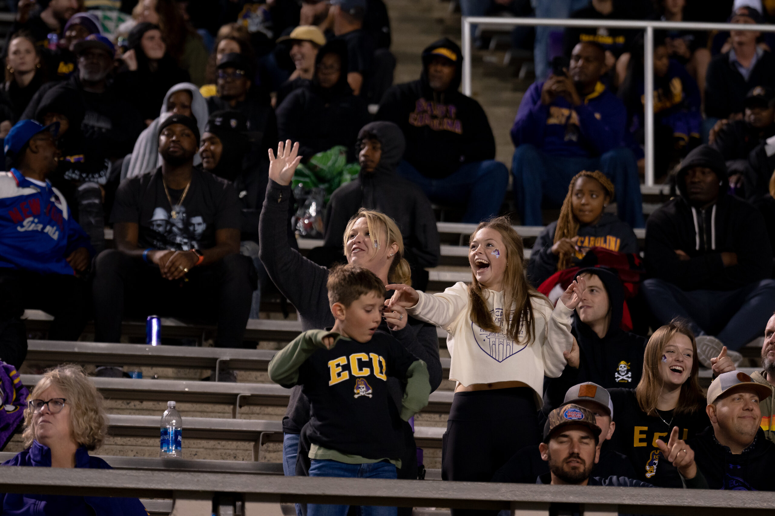 My First ECU College Football Photography Assignment 240 Fans in the stands watching the night game