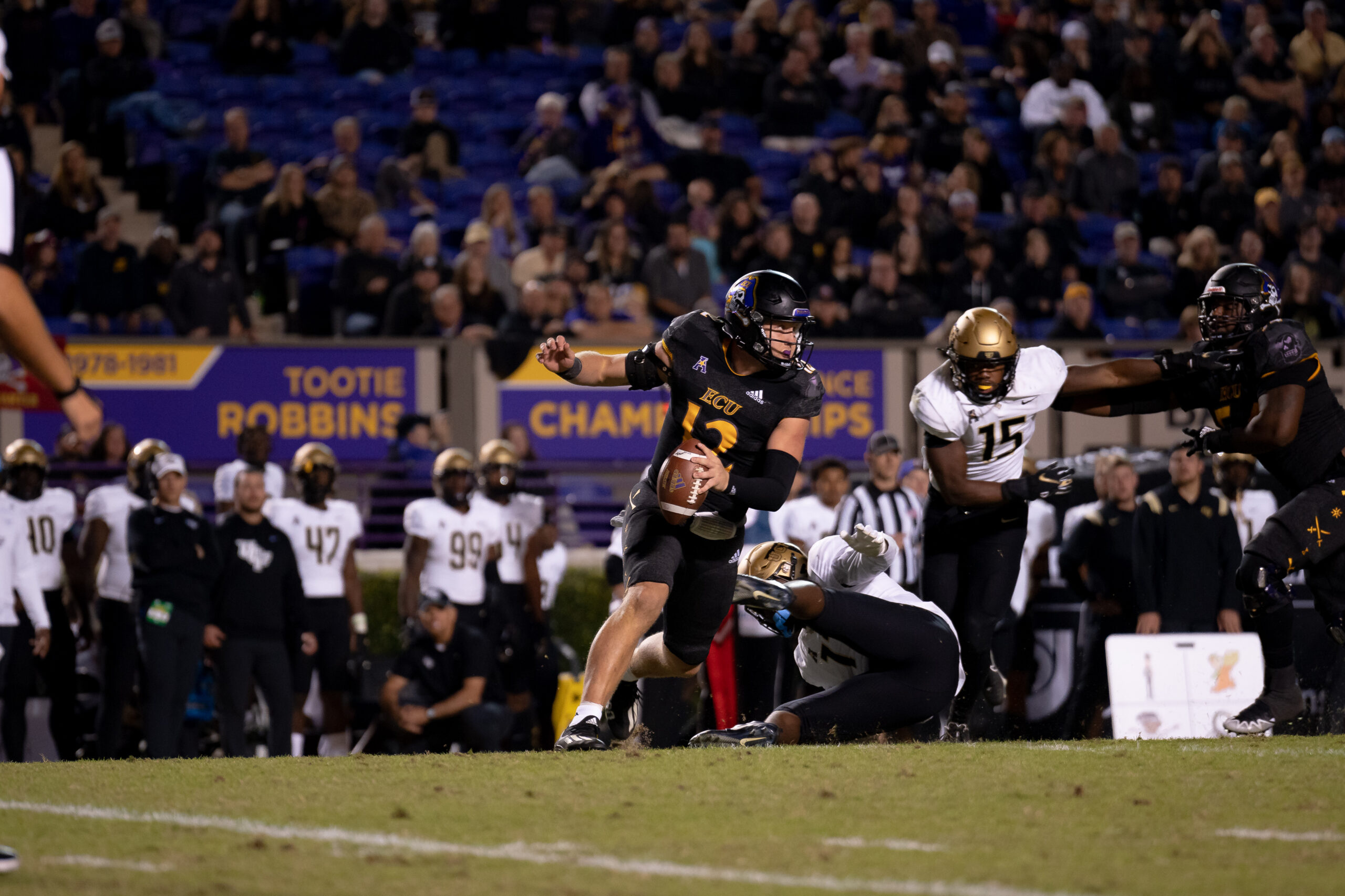 My First ECU College Football Photography Assignment 88 ECU player carrying the ball in front of the stands