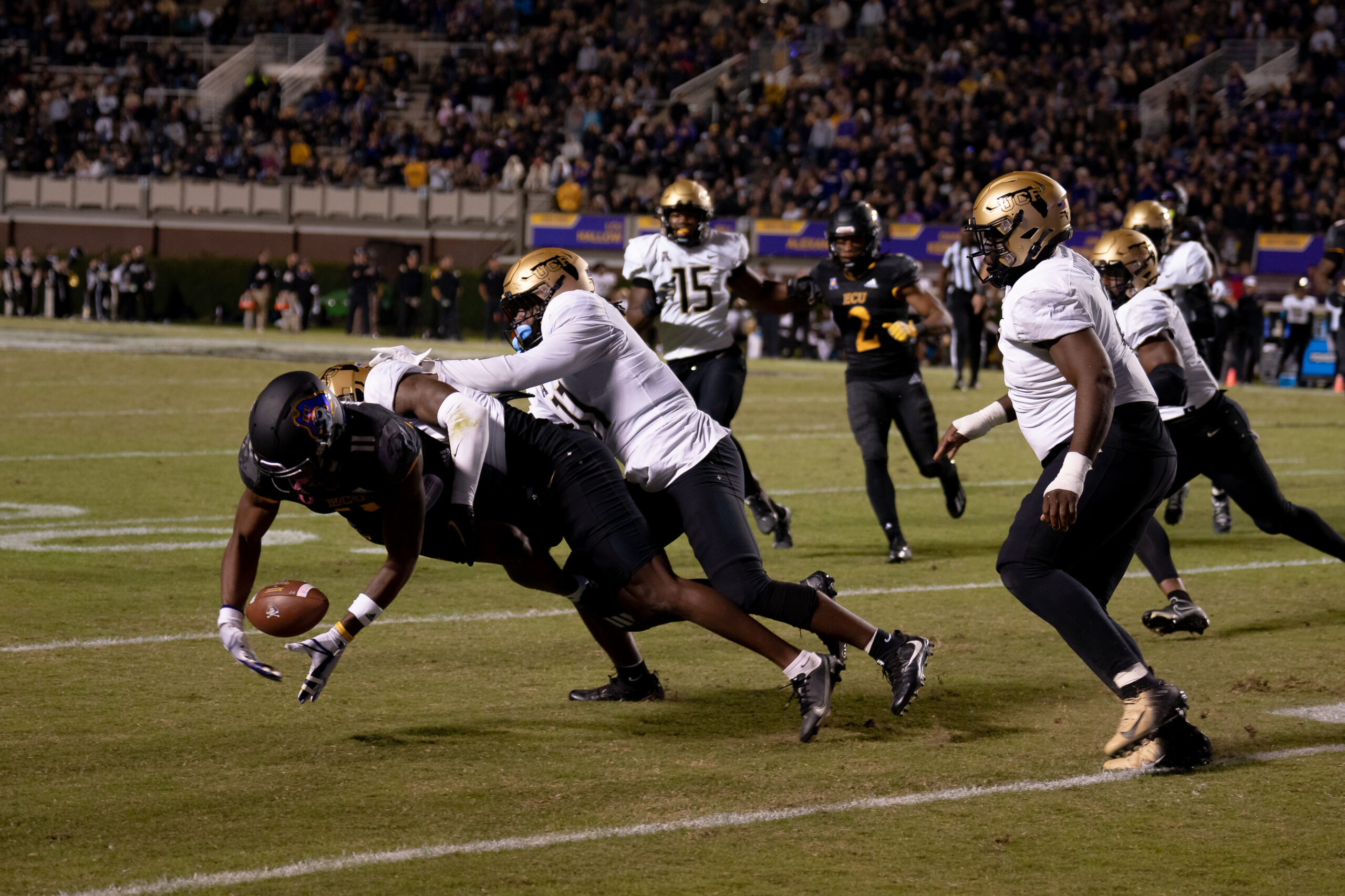 My First ECU College Football Photography Assignment 137 Ball carrier evading a tackle in the open field