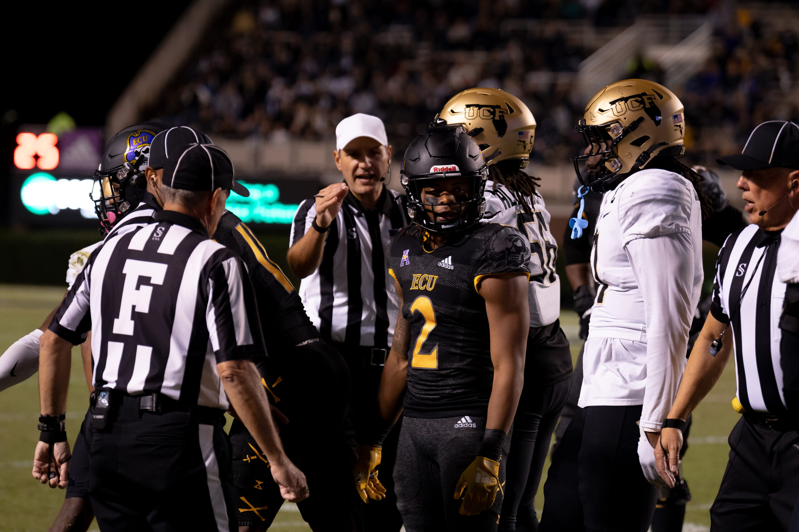 My First ECU College Football Photography Assignment 197 Officials and ECU players talking on the sideline