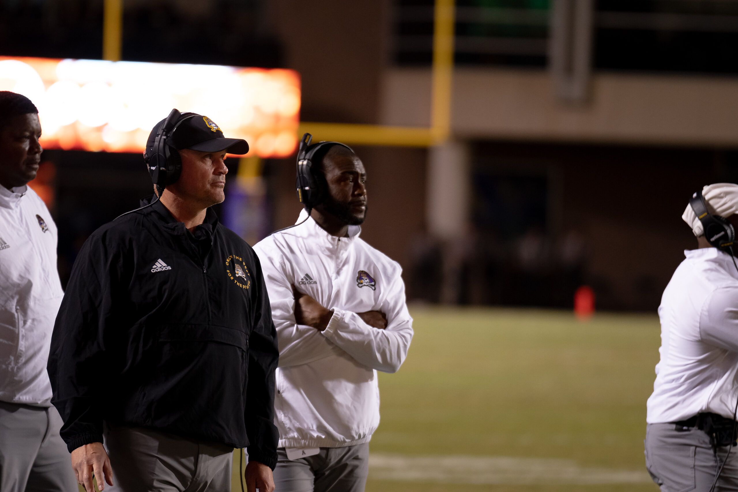 My First ECU College Football Photography Assignment 227 ECU coaches watching from the sideline in team jackets