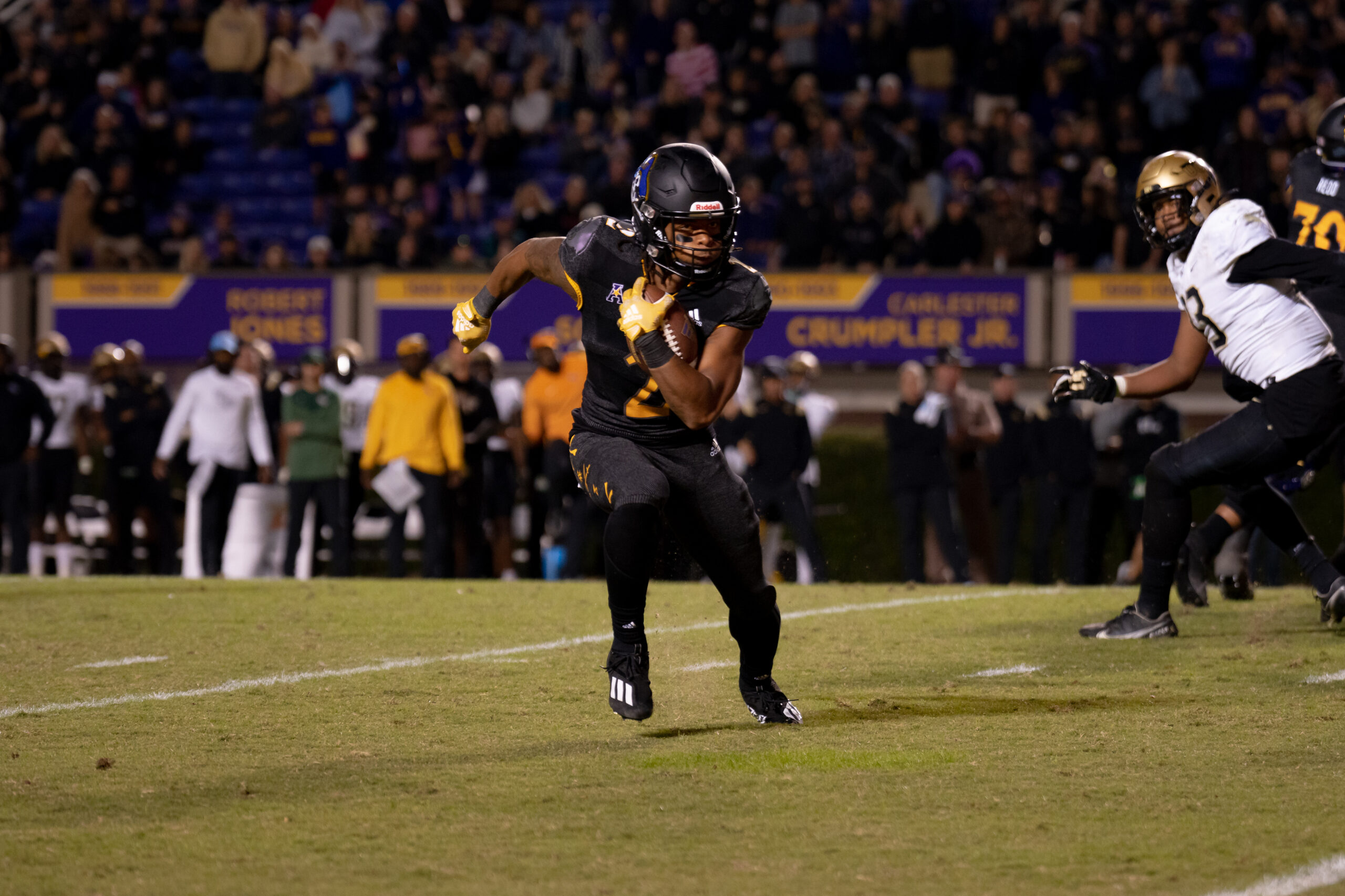My First ECU College Football Photography Assignment 20 ECU player walking off the field between plays