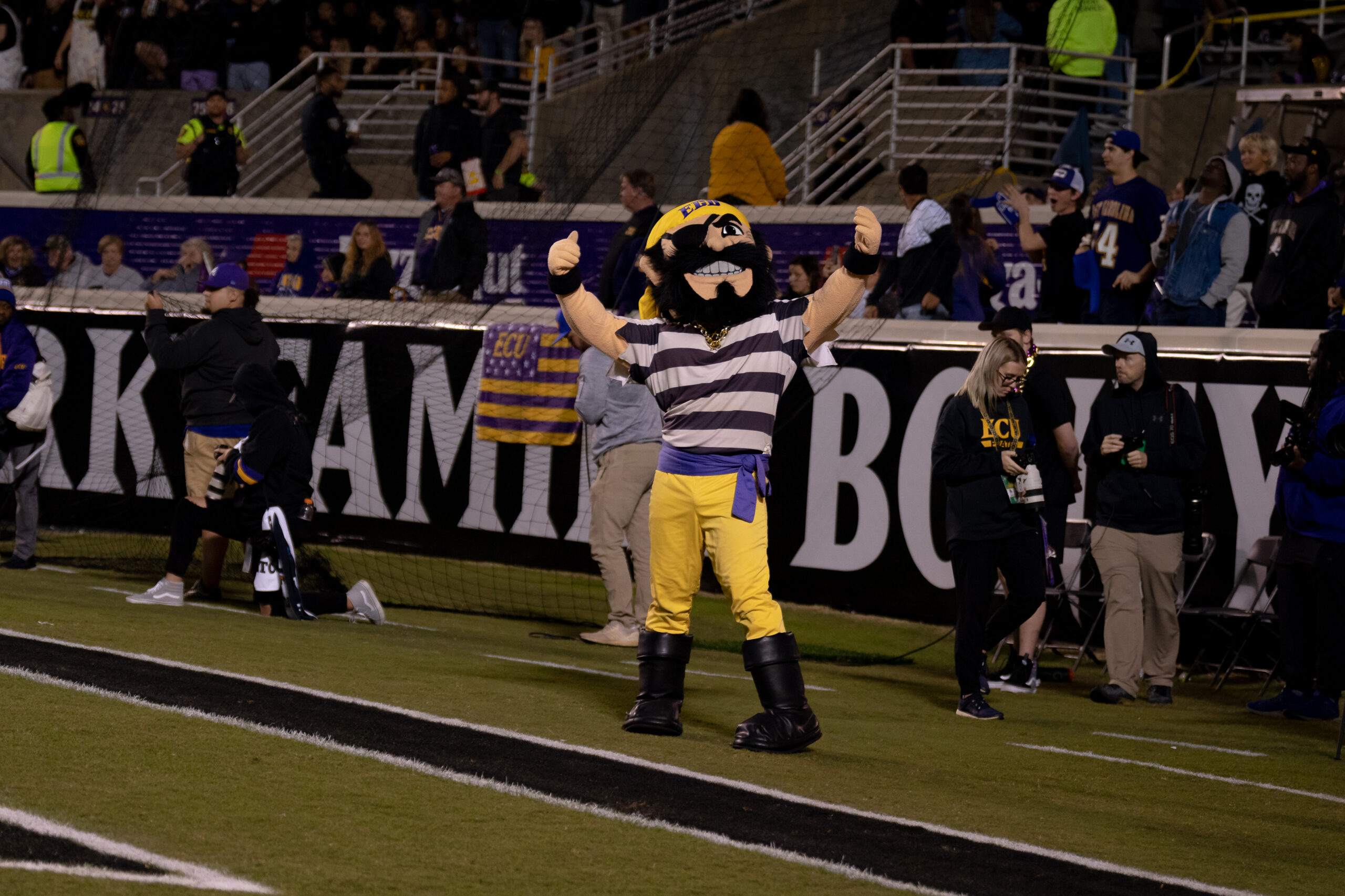 My First ECU College Football Photography Assignment 51 ECU Pirate mascot cheering in front of the stands