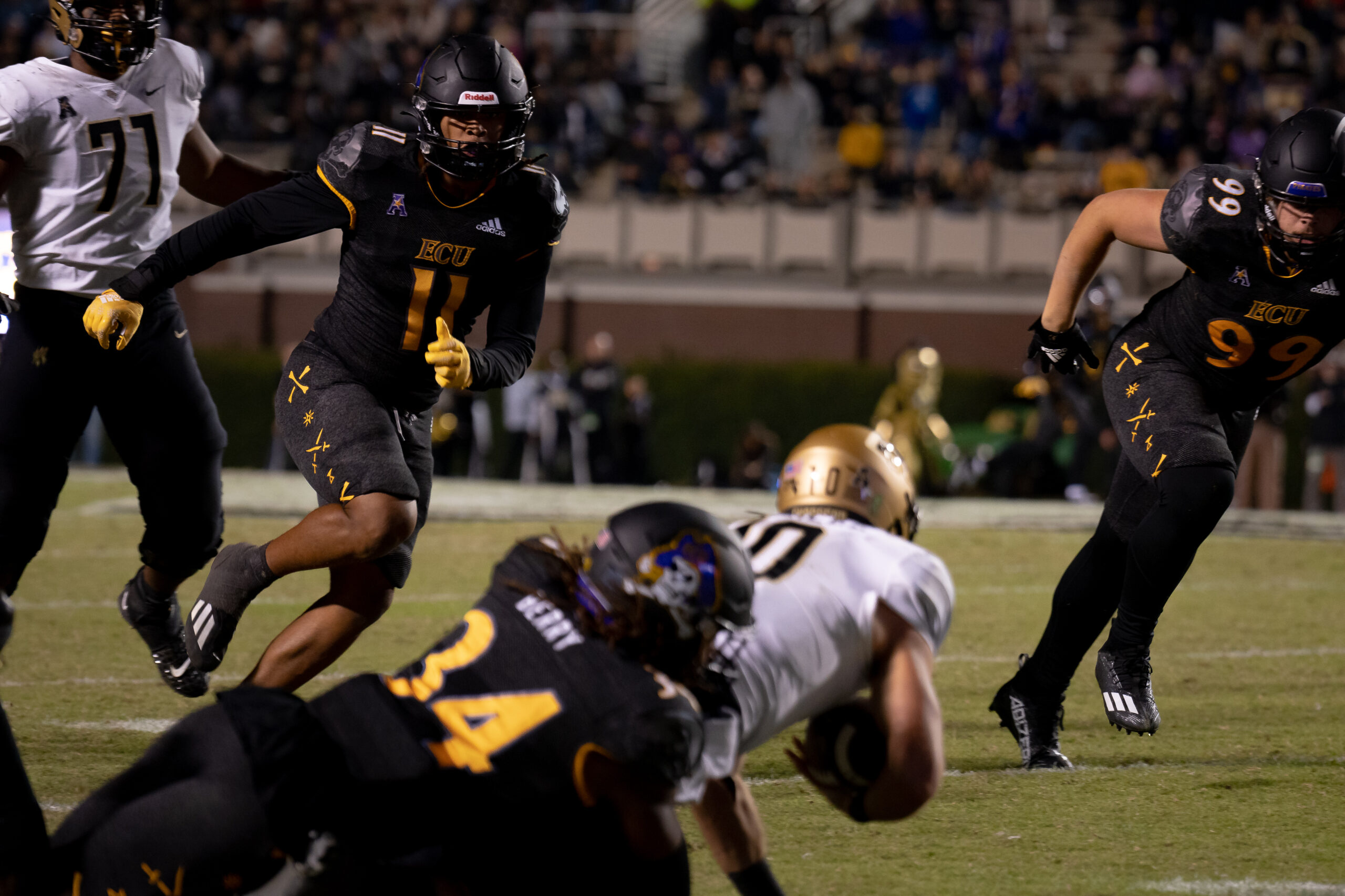 My First ECU College Football Photography Assignment 195 Defenders crashing into a ball carrier at the line