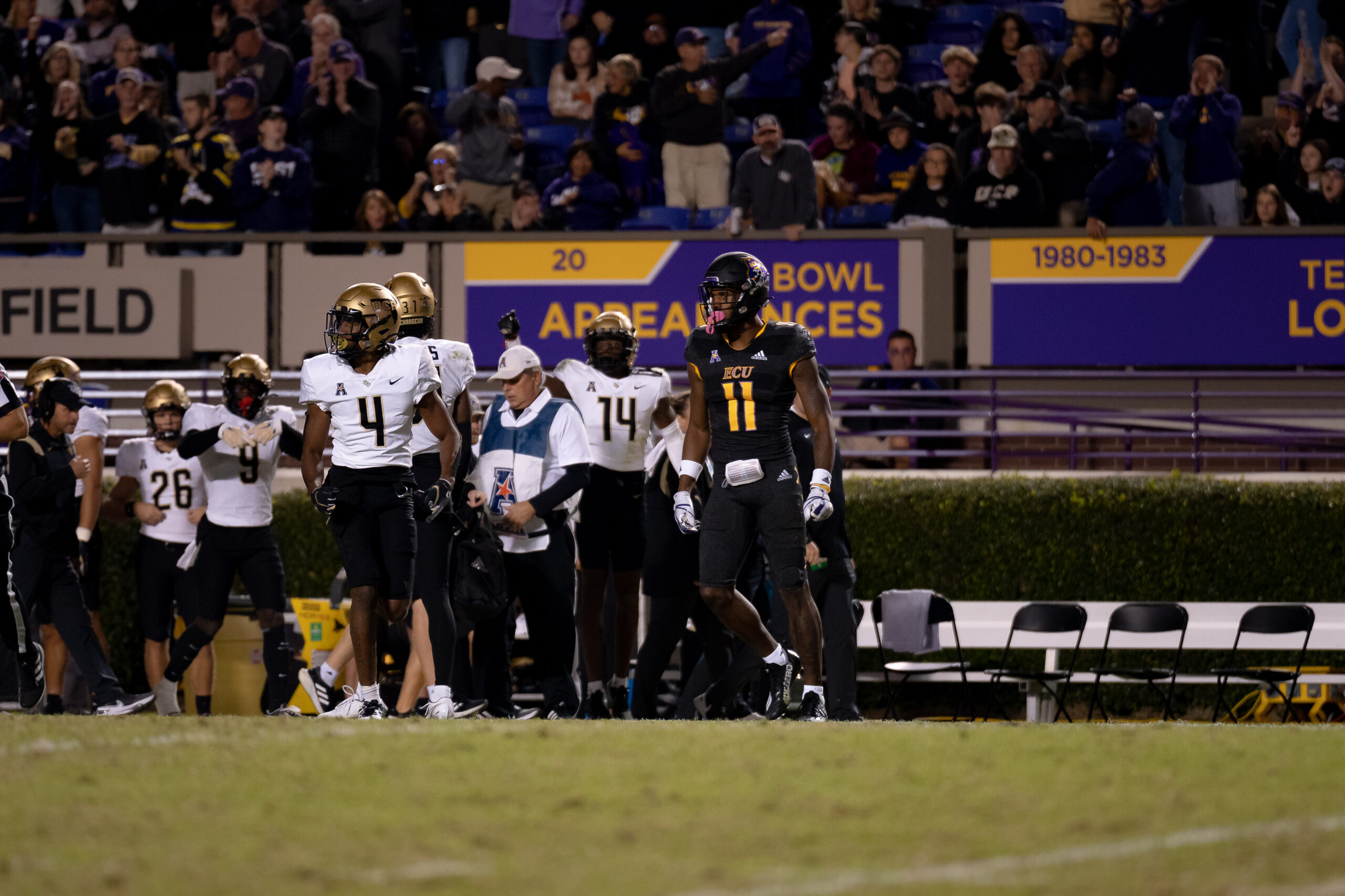 My First ECU College Football Photography Assignment 236 ECU players watching from the bench area