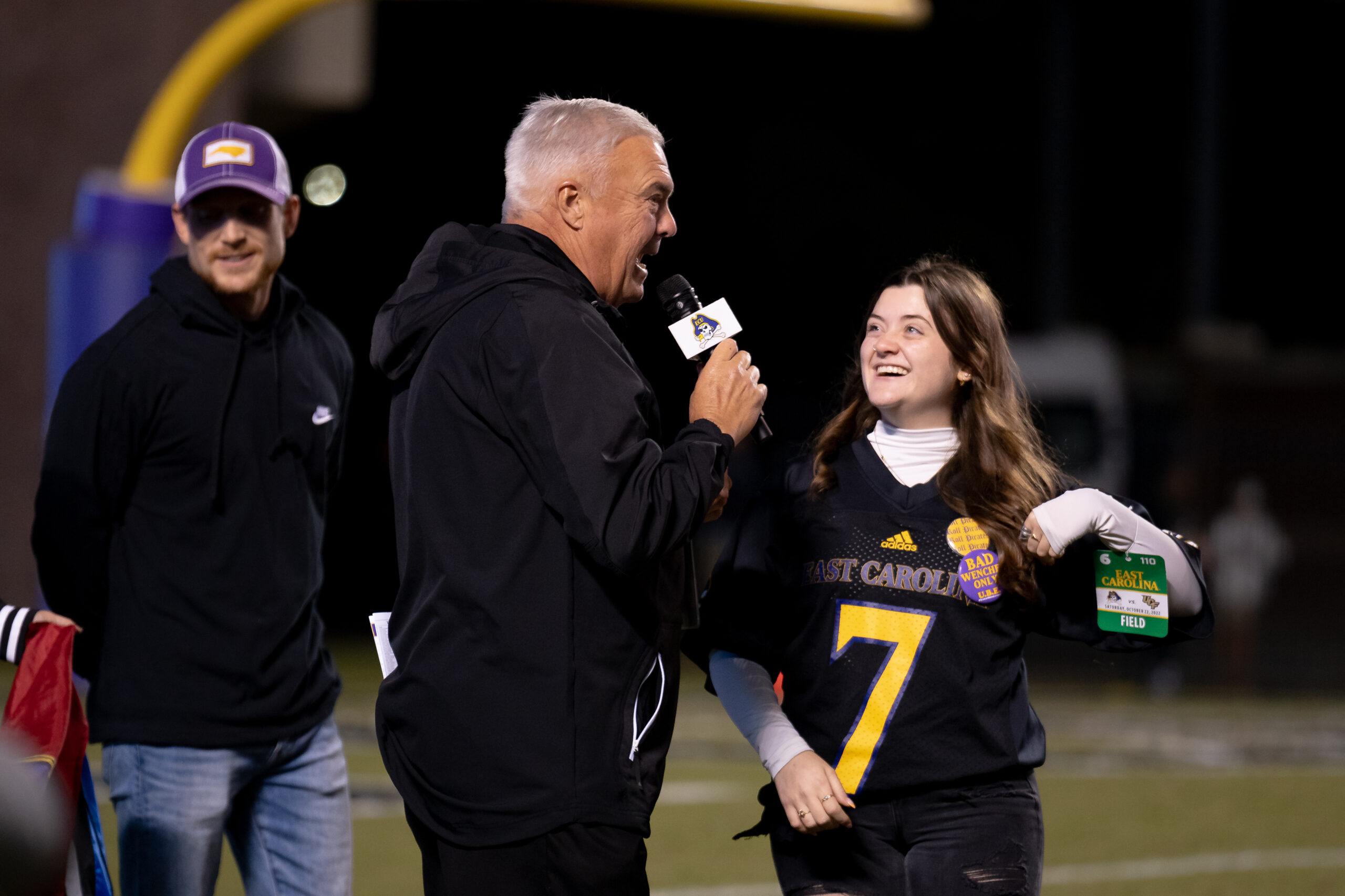 My First ECU College Football Photography Assignment 83 Broadcaster interviewing a young fan on the sideline