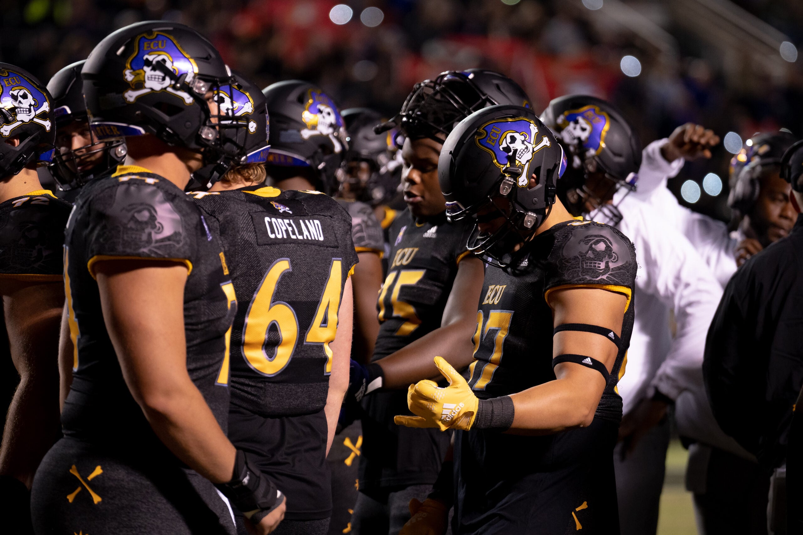 My First ECU College Football Photography Assignment 103 ECU linemen No. 64 and No. 73 talking on the sideline