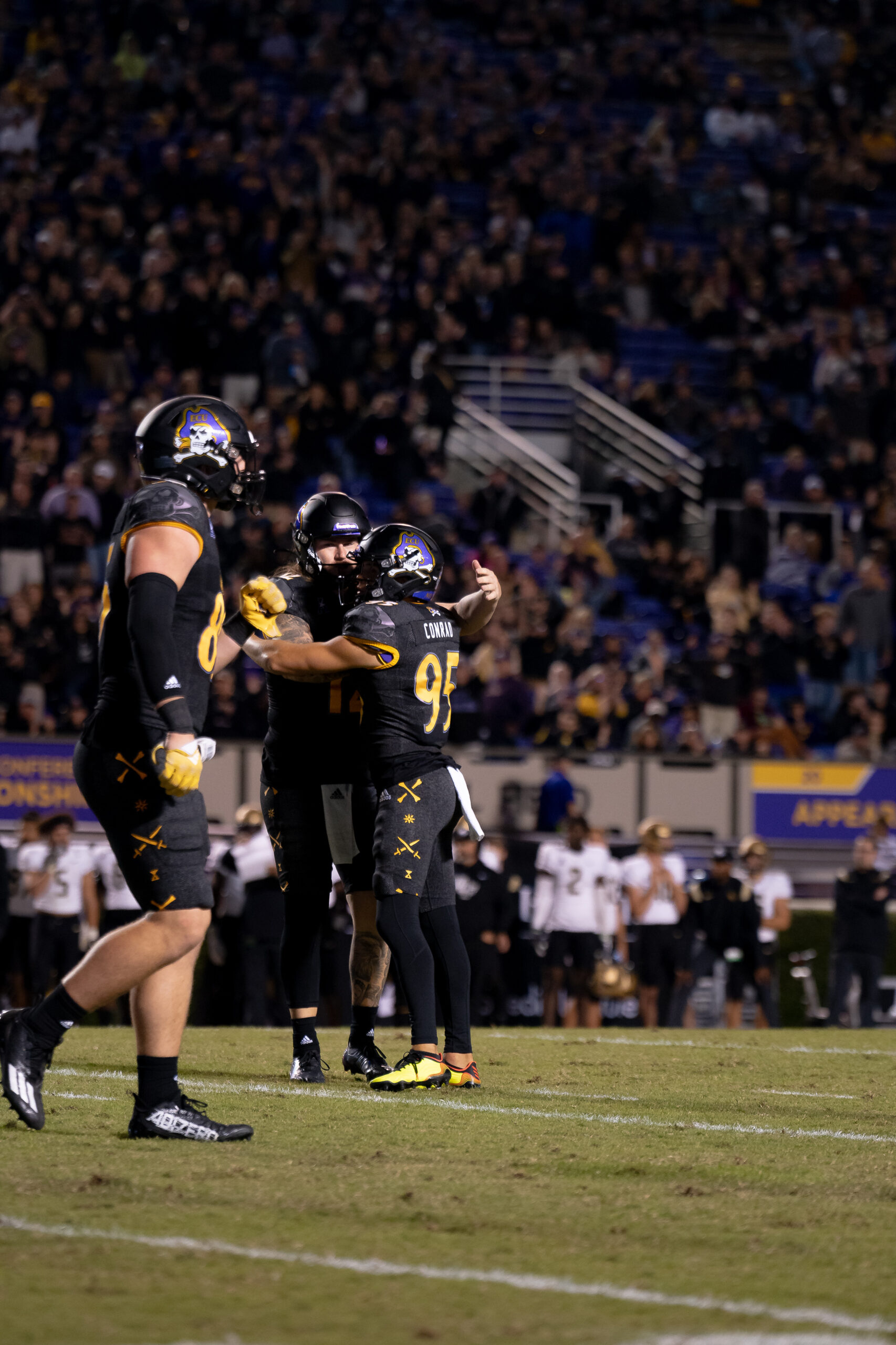 My First ECU College Football Photography Assignment 257 ECU players celebrating on the sideline