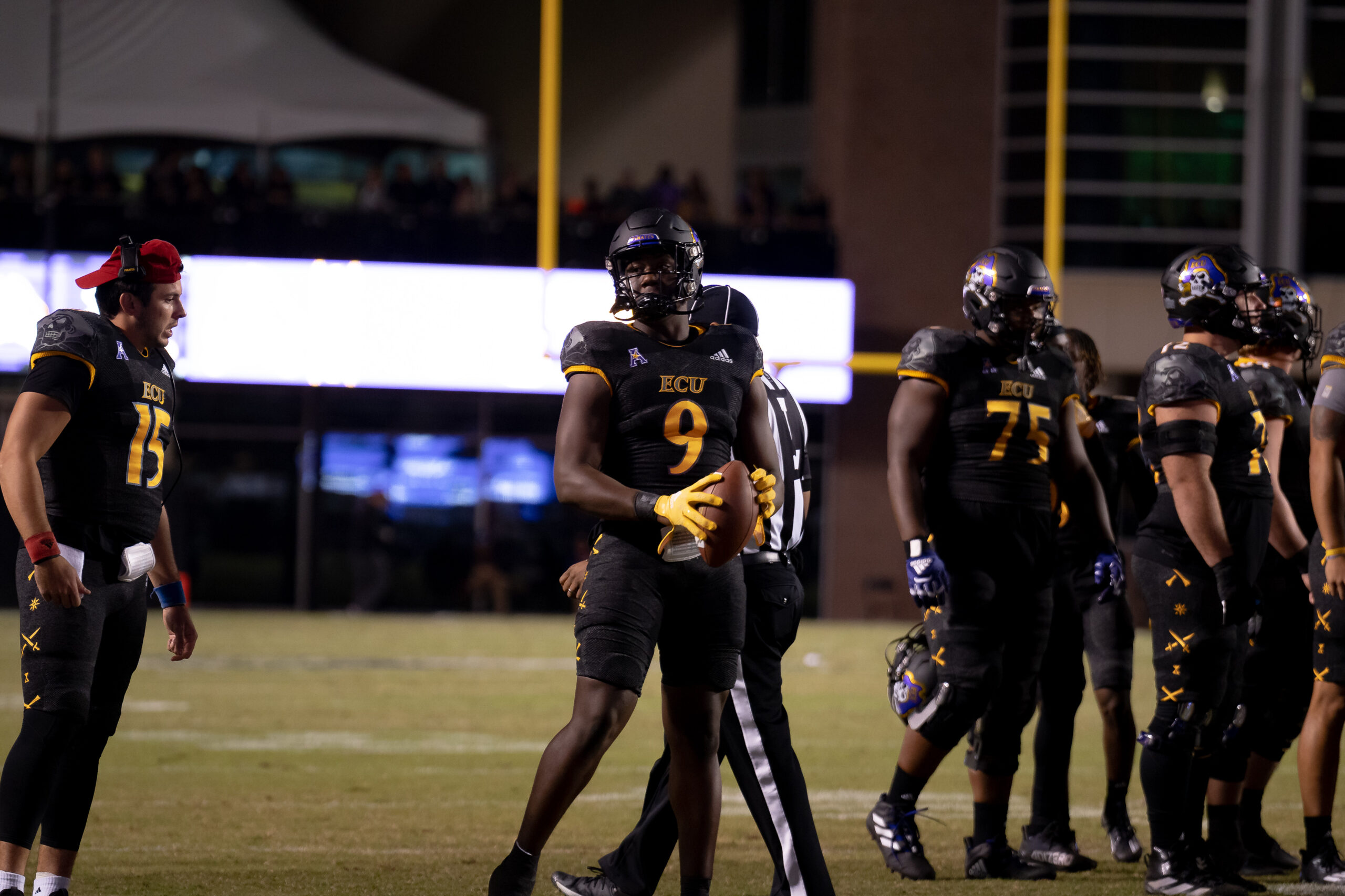My First ECU College Football Photography Assignment 78 ECU players gathered near the sideline between plays