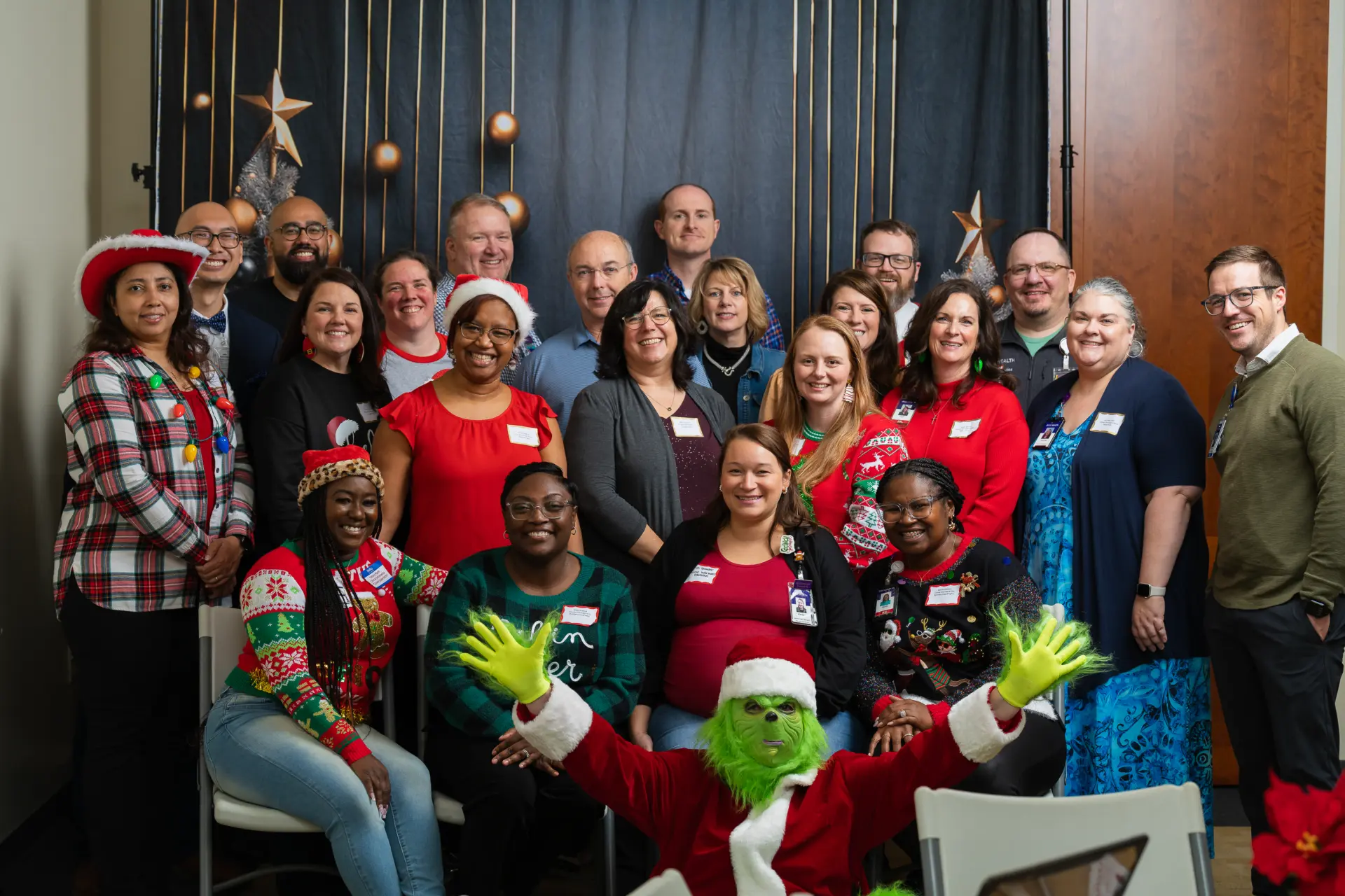 Large team group photo at the company holiday party
