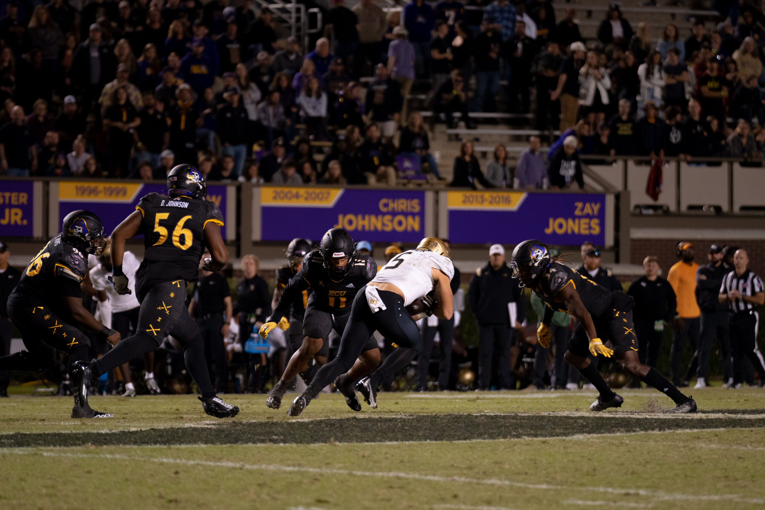 My First ECU College Football Photography Assignment 173 Players in motion at midfield during the ECU vs. UCF game