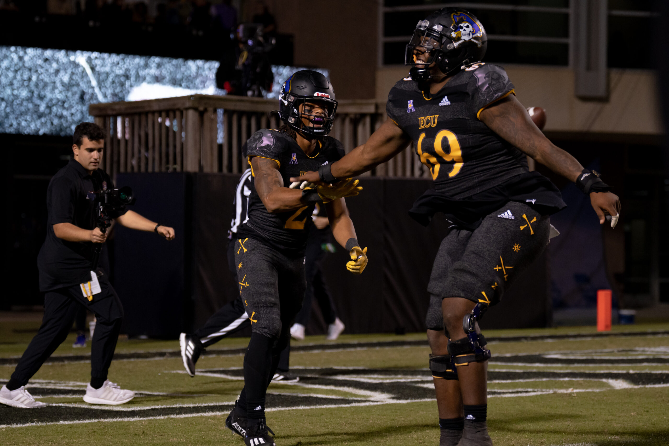 My First ECU College Football Photography Assignment 129 ECU player celebrating a big play on the field