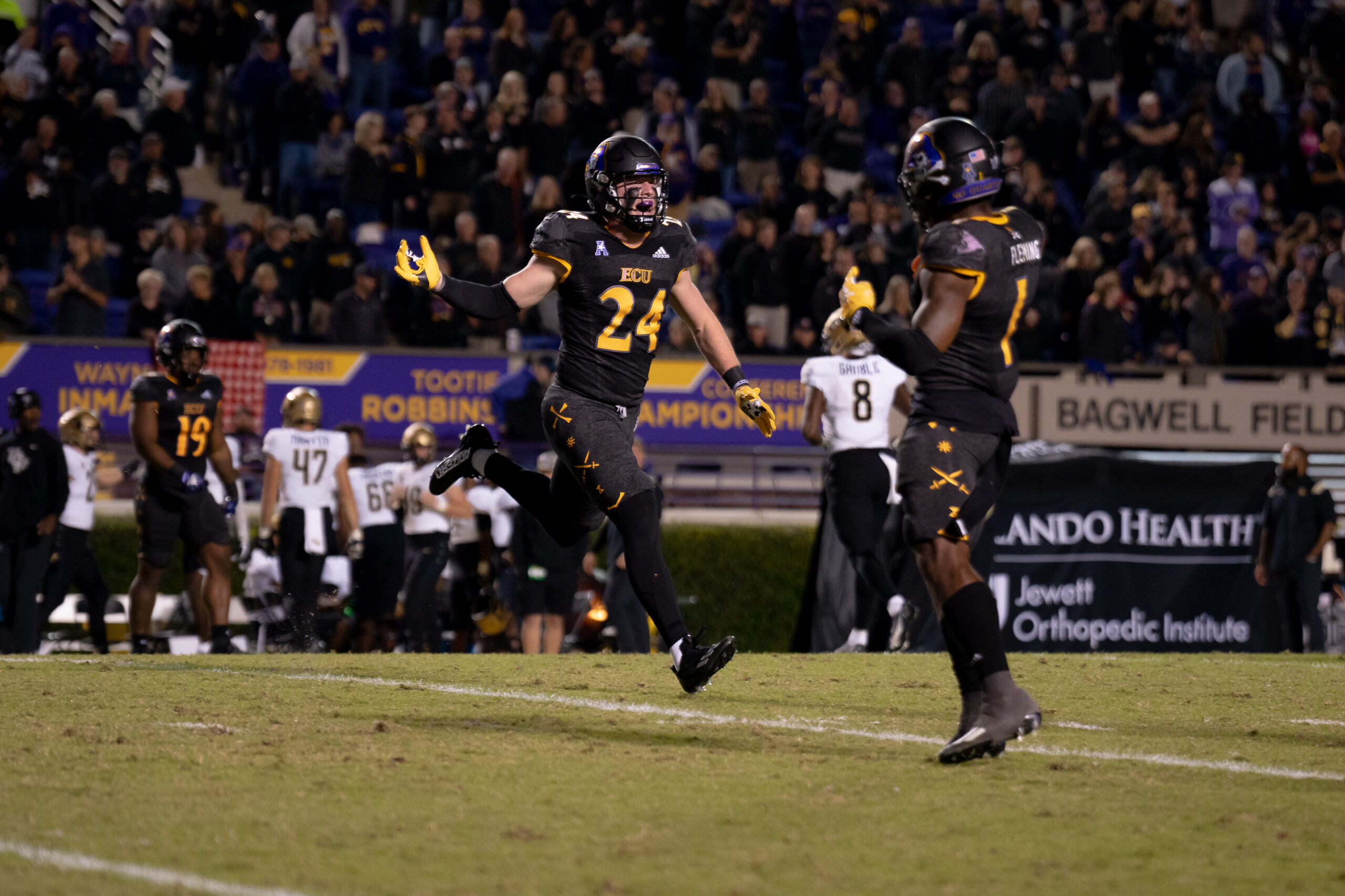 My First ECU College Football Photography Assignment 262 ECU player returning a kick