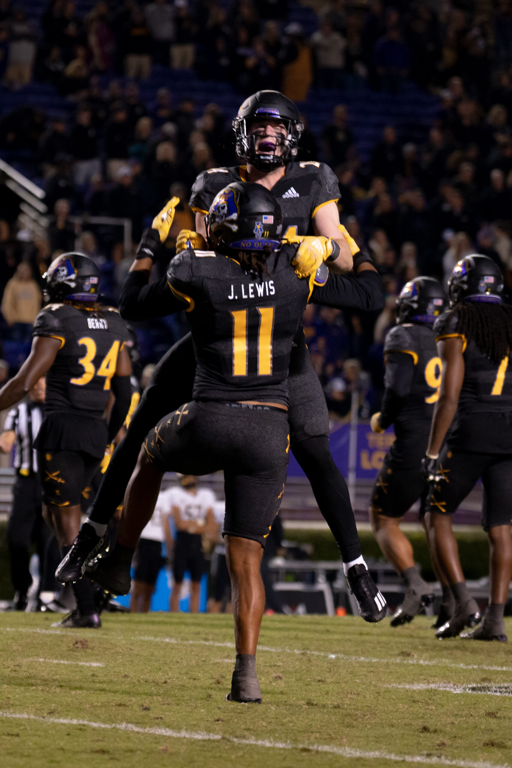 My First ECU College Football Photography Assignment 165 ECU player No. 11 standing on the field during a timeout