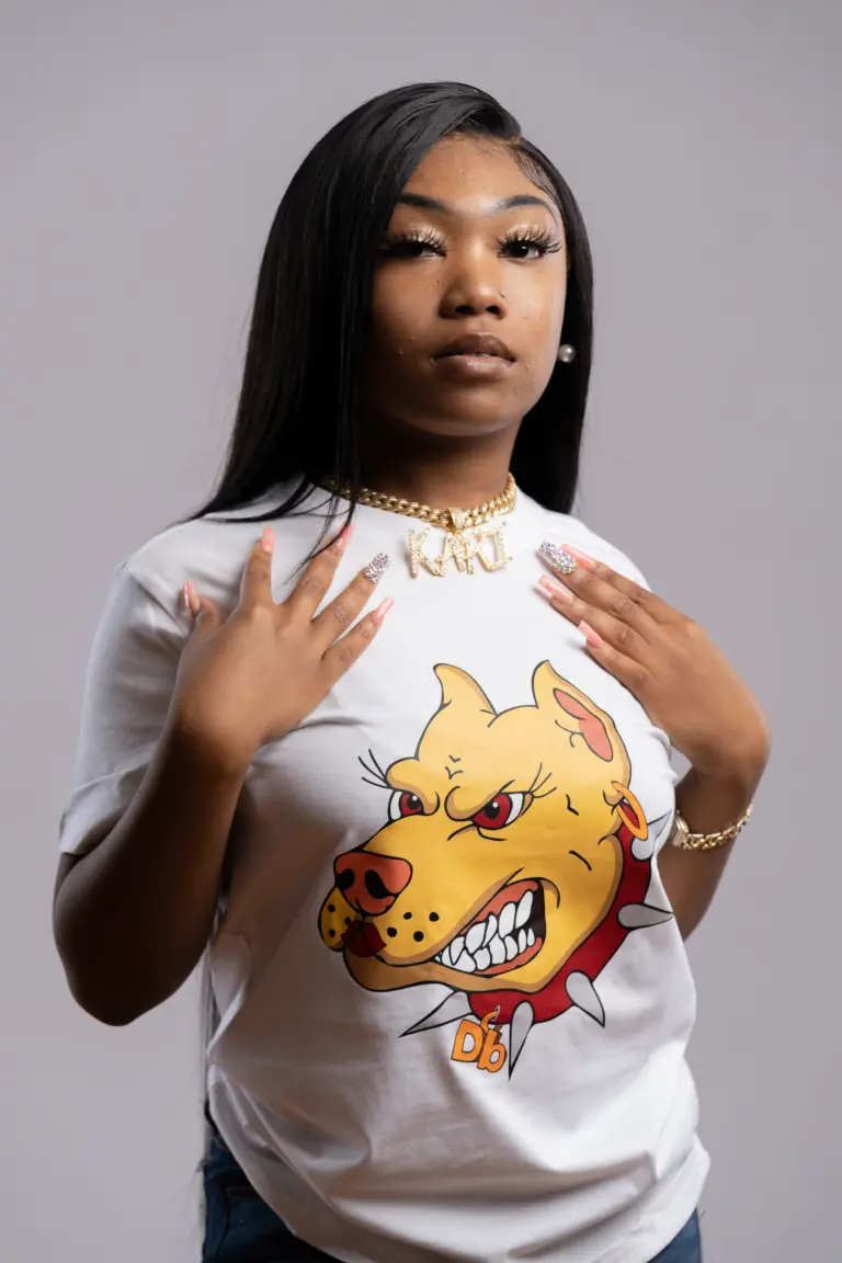 Brand portrait of a woman wearing a white graphic T-shirt