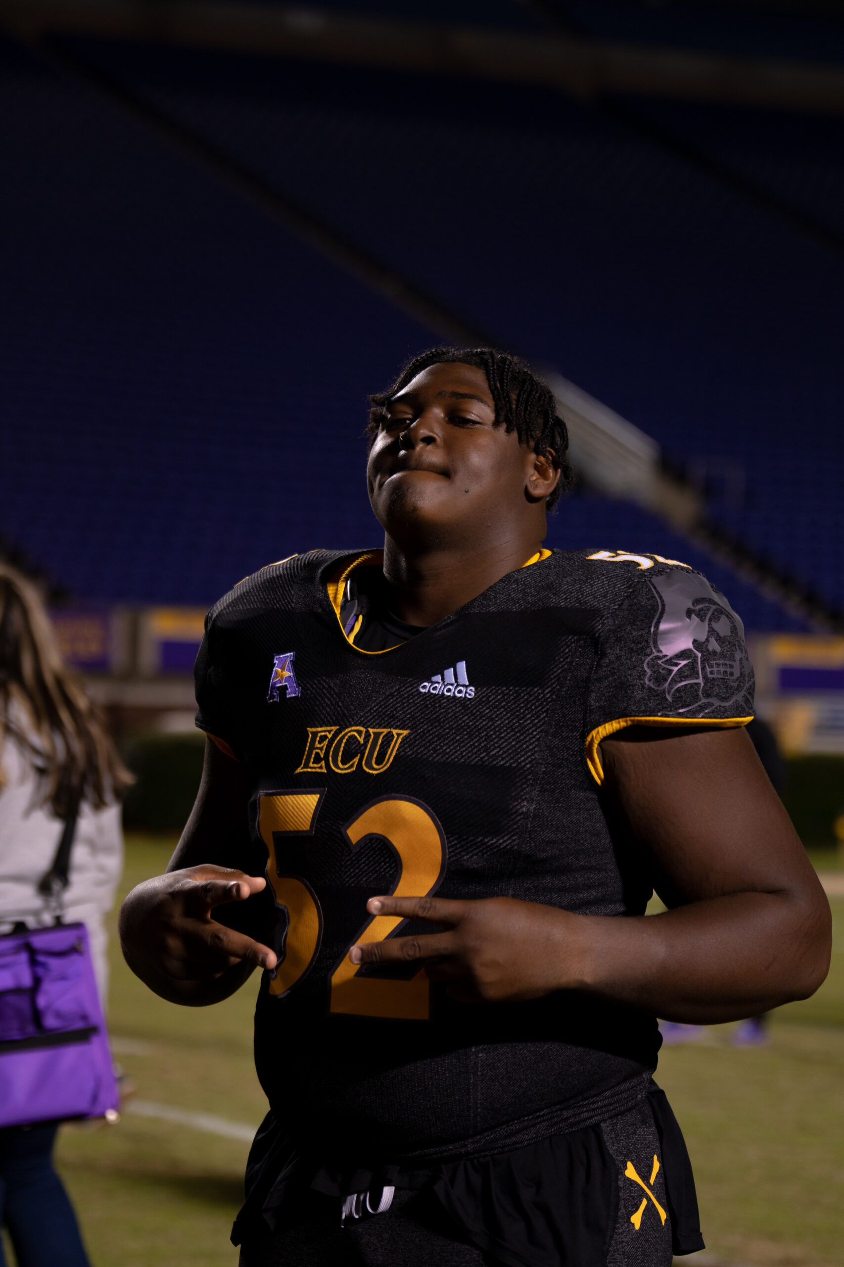 My First ECU College Football Photography Assignment 180 ECU player in the spotlight on the sideline