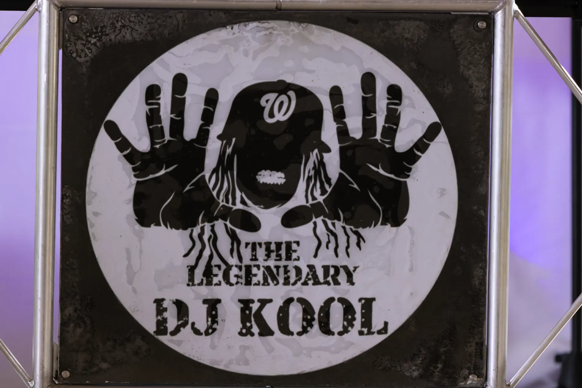 DJ Kool logo backdrop at the event