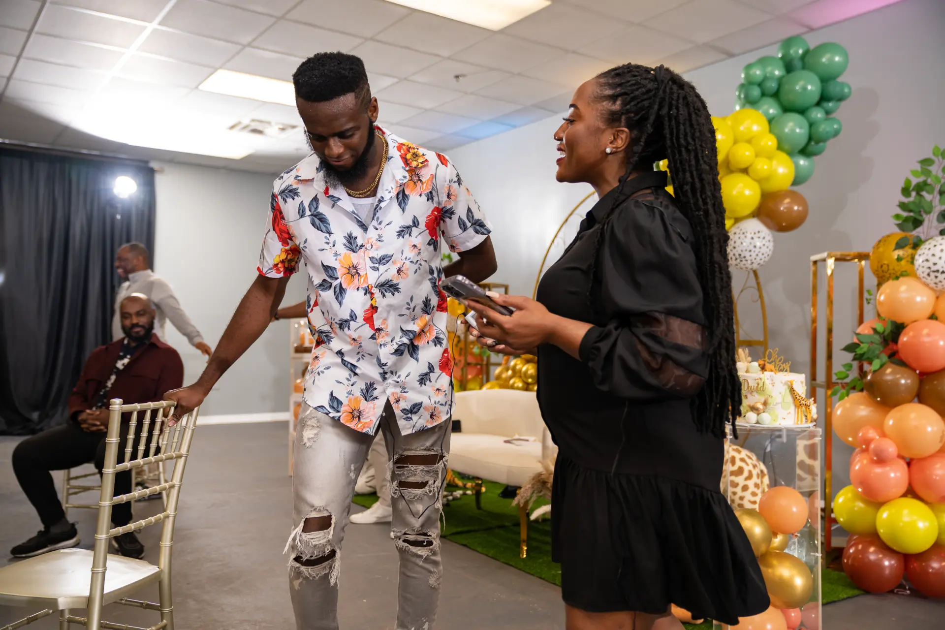 Two guests sharing a laugh on the dance floor