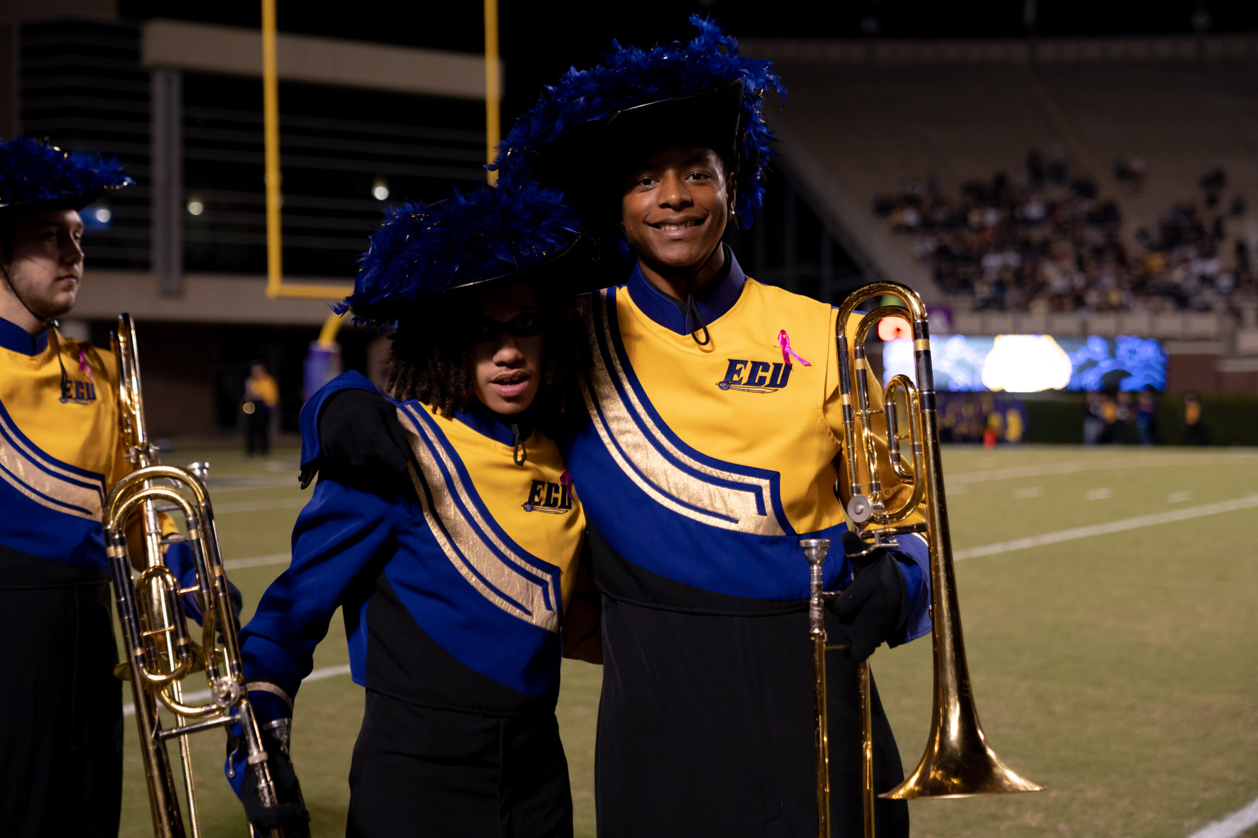 My First ECU College Football Photography Assignment 14 ECU band trombonist in a plumed hat performing