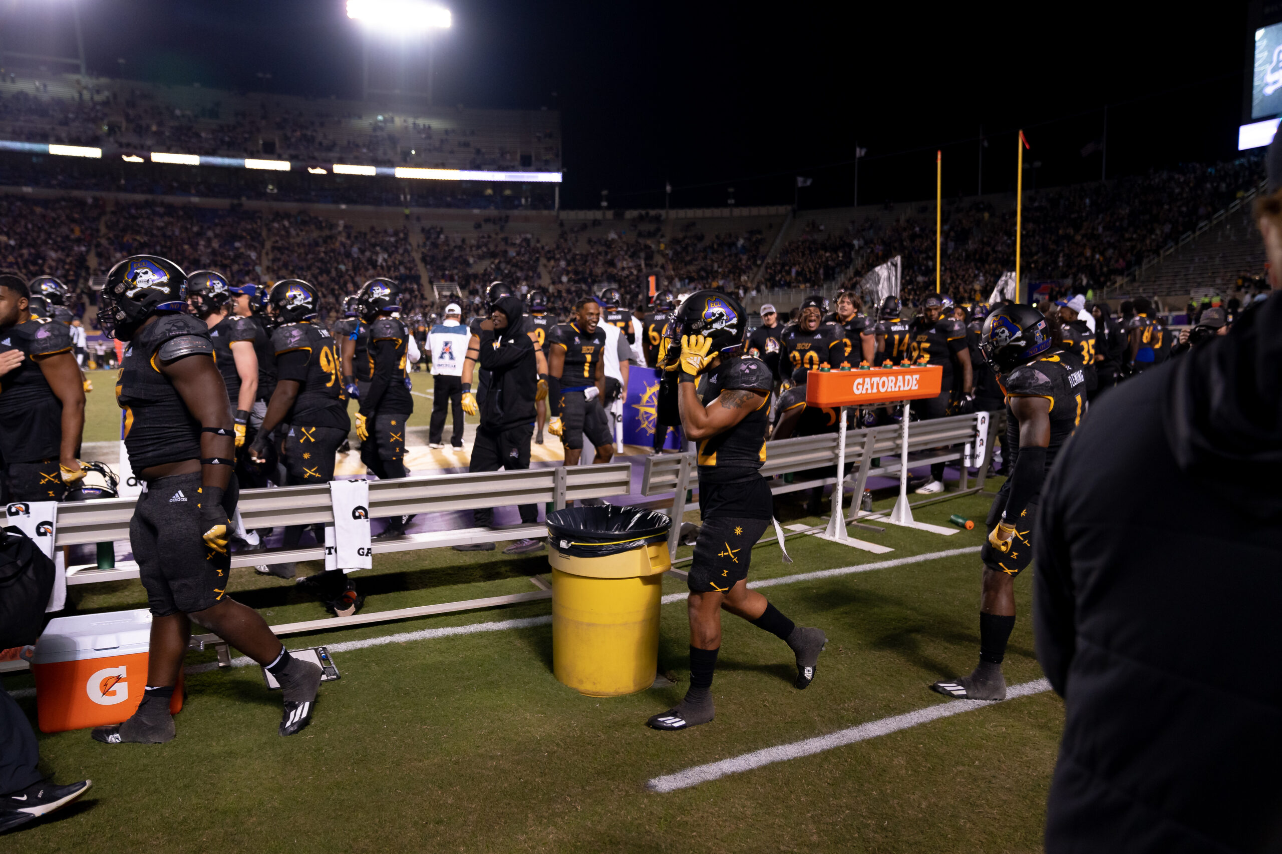 My First ECU College Football Photography Assignment 286 ECU band and fans along the sideline at night