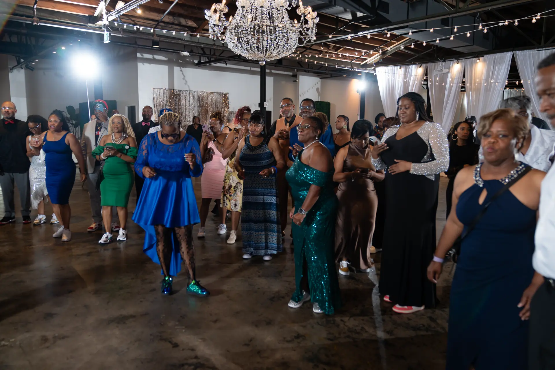 Packed dance floor at a festive event hall