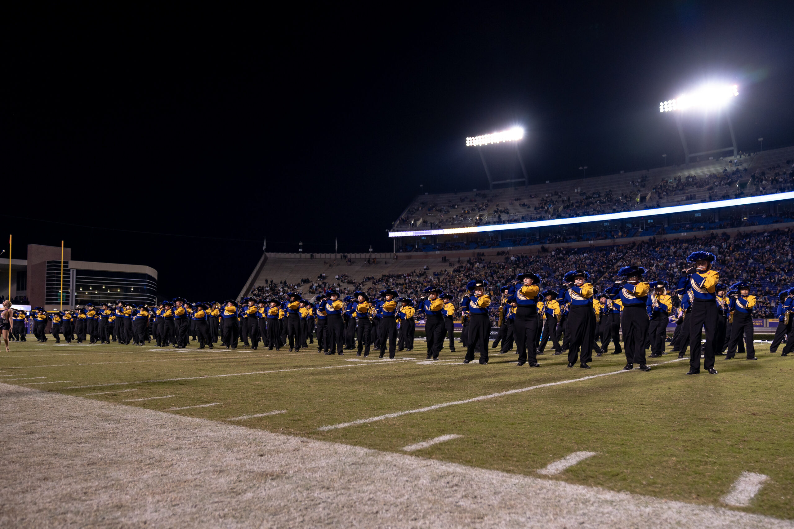 My First ECU College Football Photography Assignment 5 Stadium lights glowing over the field before kickoff