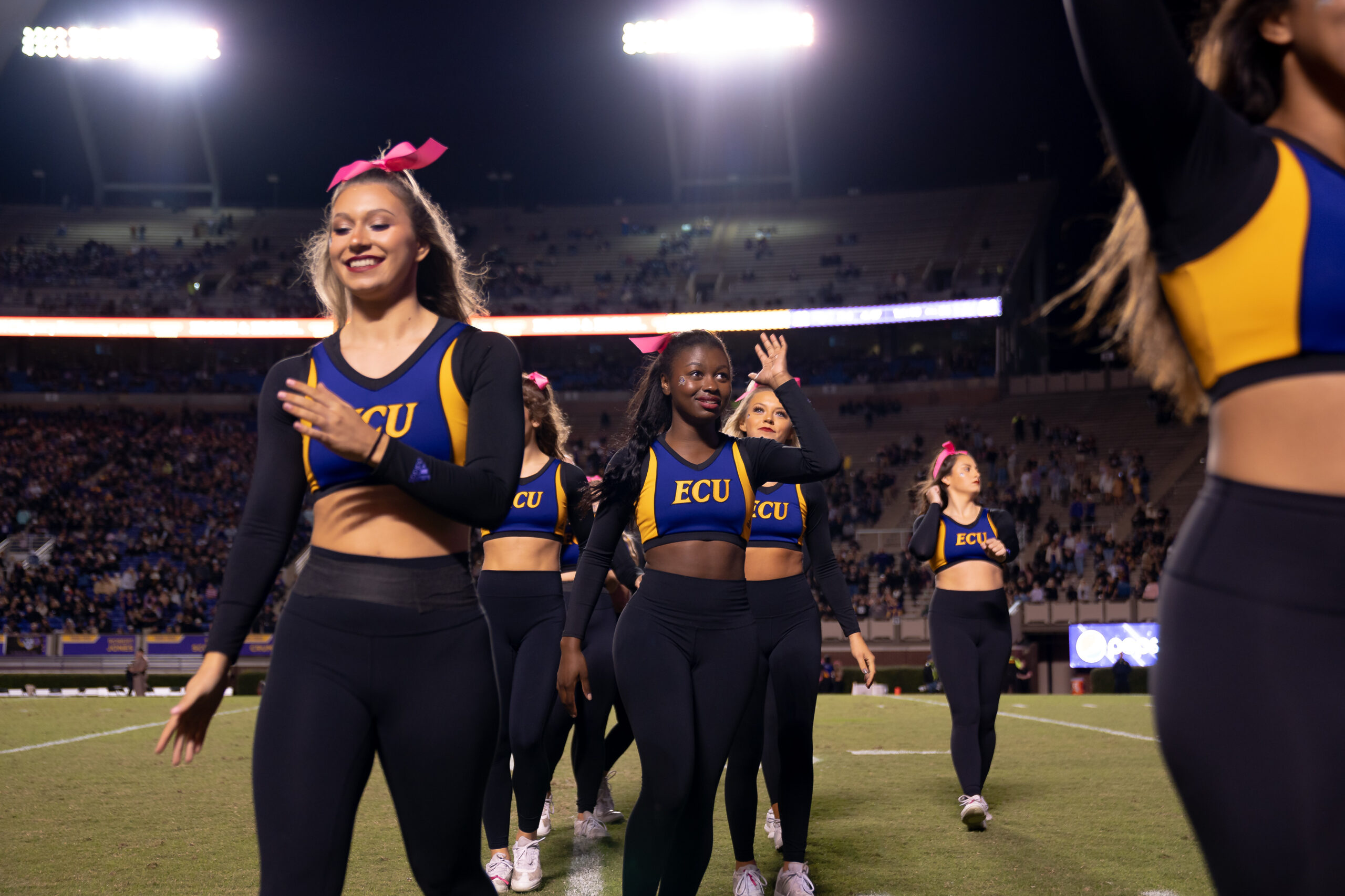 My First ECU College Football Photography Assignment 287 ECU cheerleaders cheering on the sideline under the lights