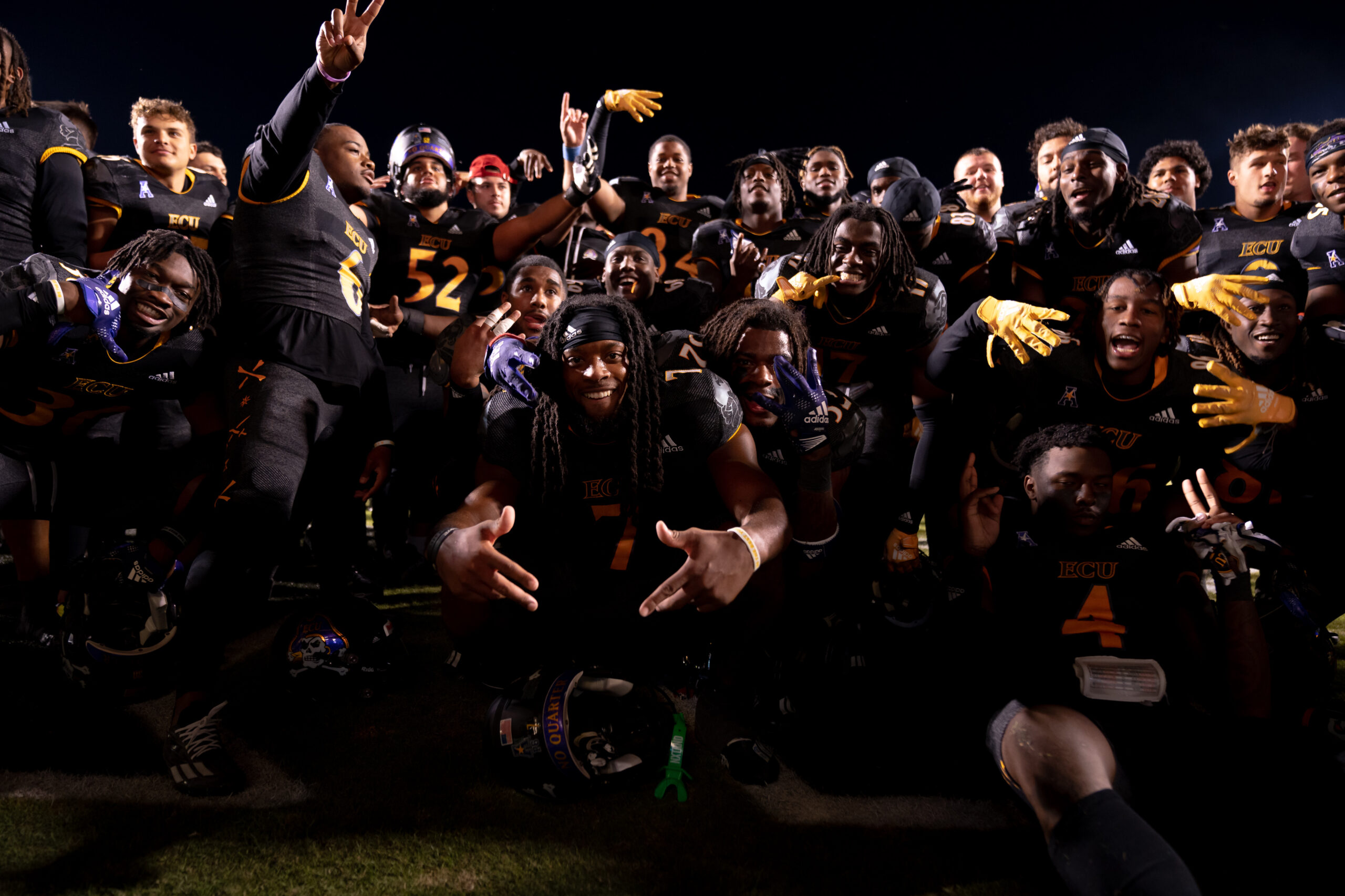 My First ECU College Football Photography Assignment 10 ECU fans cheering in the student section