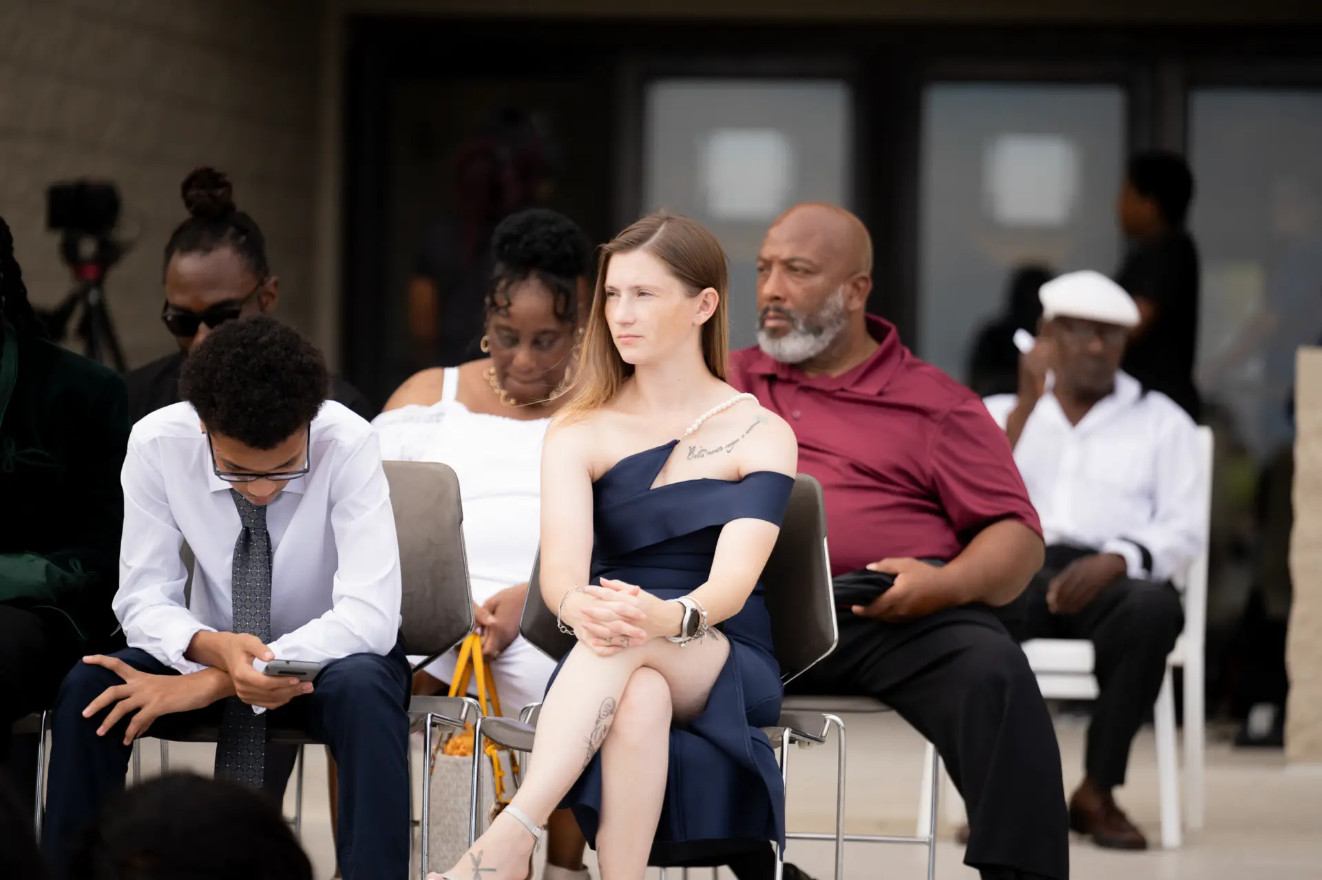 Wedding guests seated and watching the ceremony