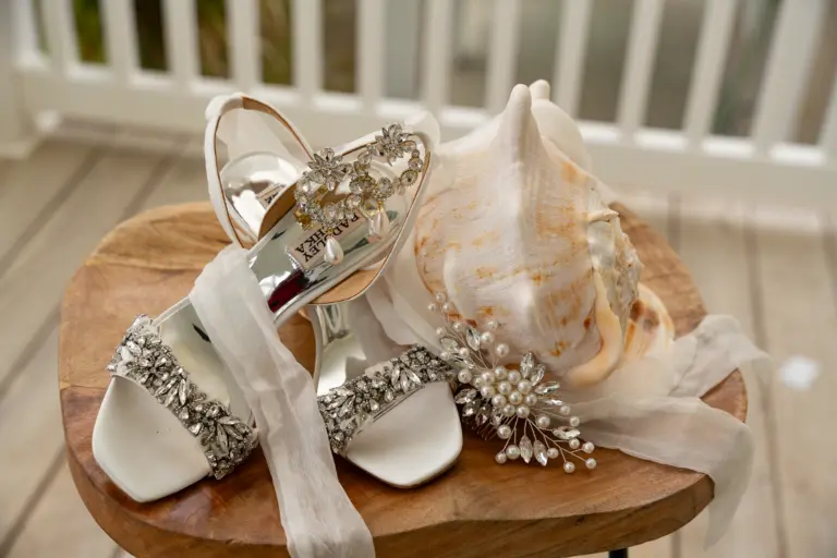 Planning Your First Wedding – The Complete Guide 1 Bride's jeweled heels arranged with lace details